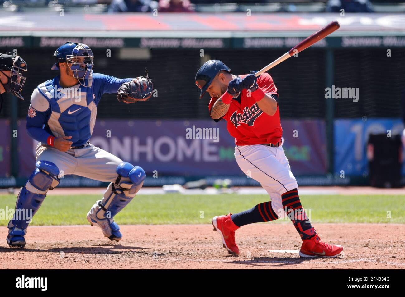 CLEVELAND, OH - MAY 12: Eddie Rosario (9) of the Cleveland Indians backs away from a tight pitch while batting during a game against the Chicago Cubs Stock Photo