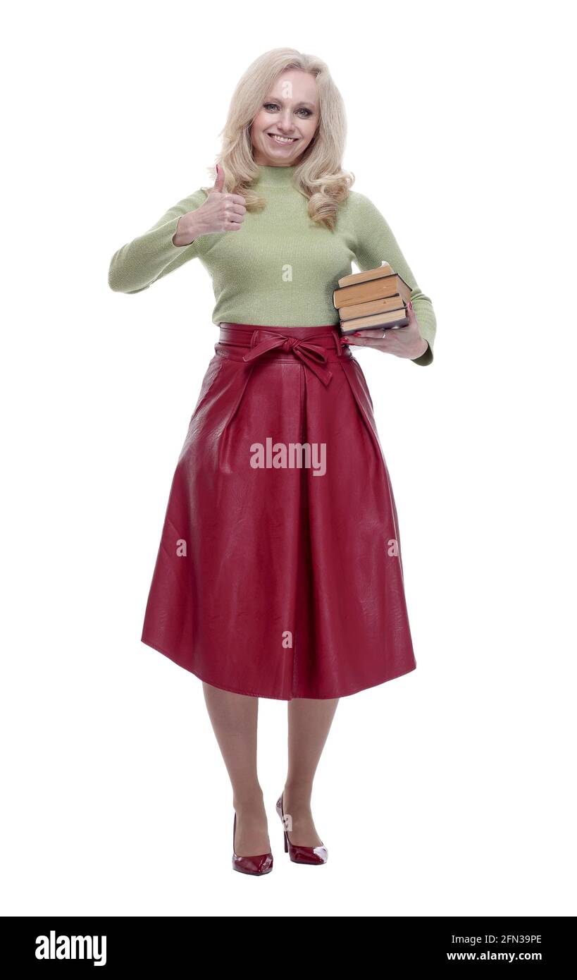 happy woman with a stack of books giving a thumbs up Stock Photo - Alamy