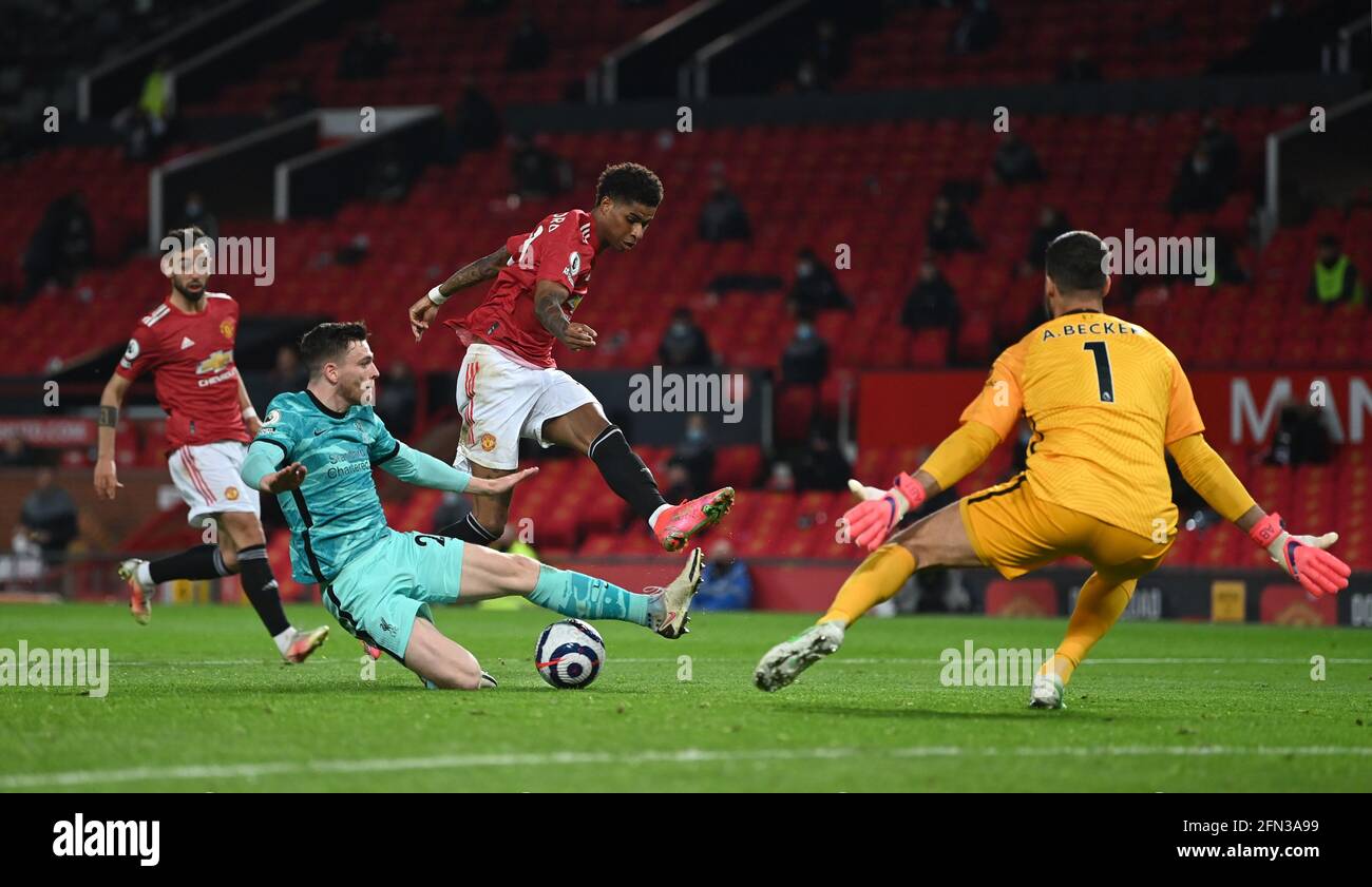 Manchester United's Marcus Rashford scores their side's second goal of the game during the Premier League match at Old Trafford, Manchester. Picture date: Thursday May 13, 2021. Stock Photo