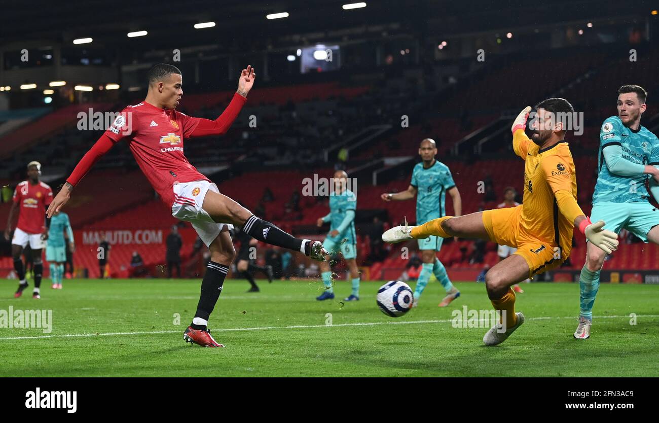 Manchester United's Mason Greenwood shoots at goal during the Premier League match at Old Trafford, Manchester. Picture date: Thursday May 13, 2021. Stock Photo
