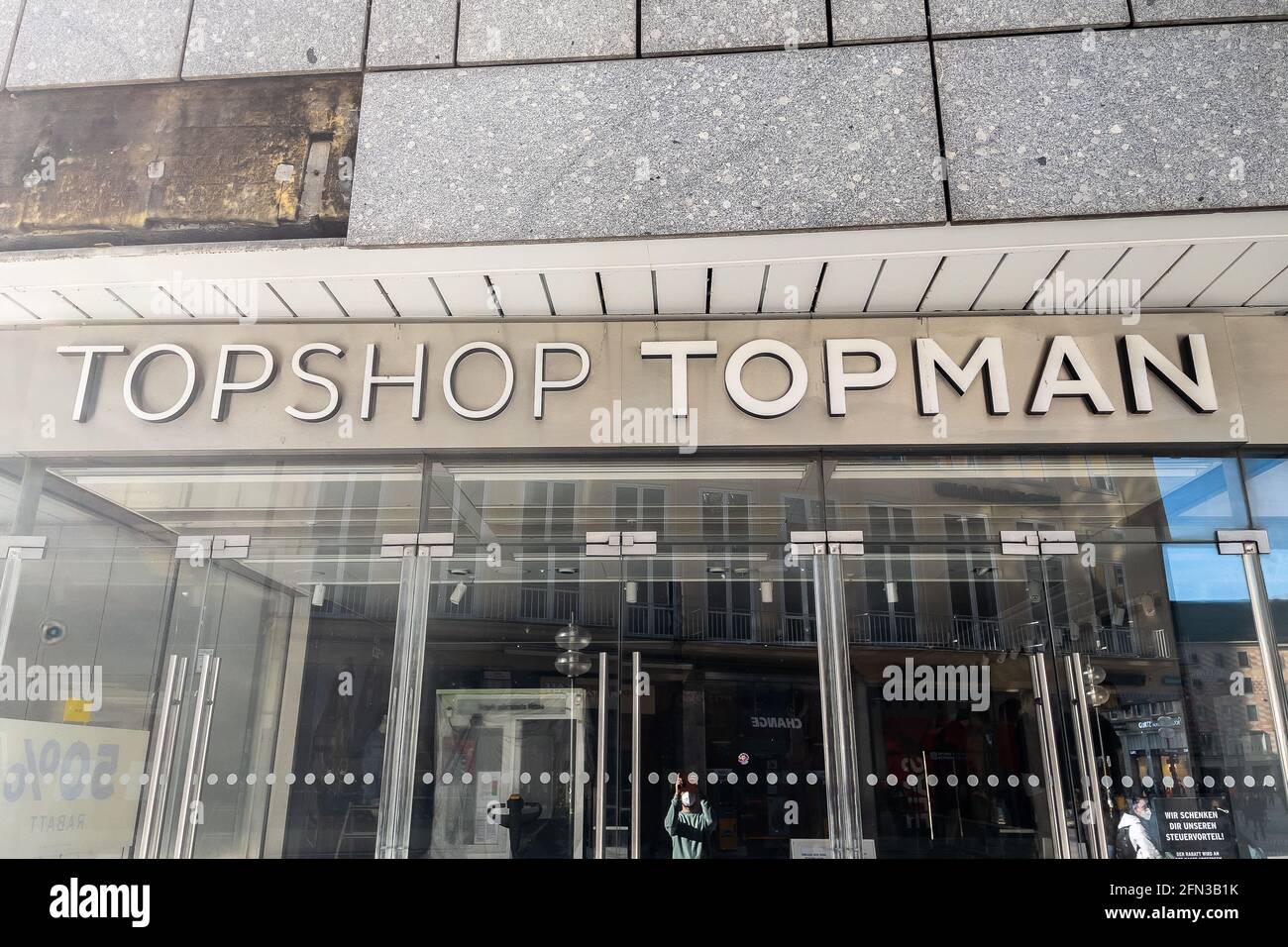 Topshop and Topman fashion retail store sign in Munich Stock Photo - Alamy