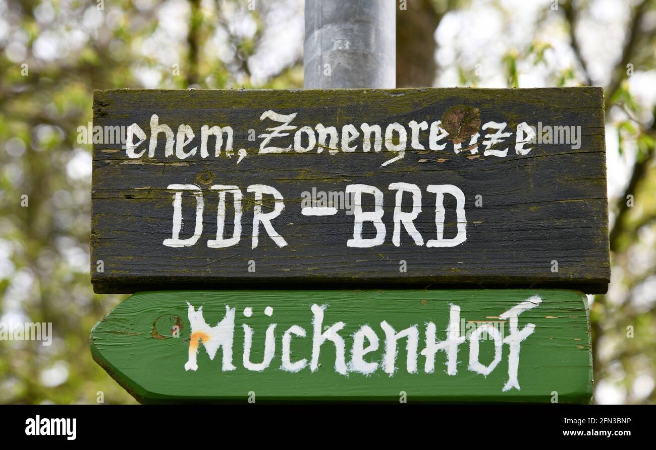 former border between GDR and FRG and signpost to a former farm Stock Photo