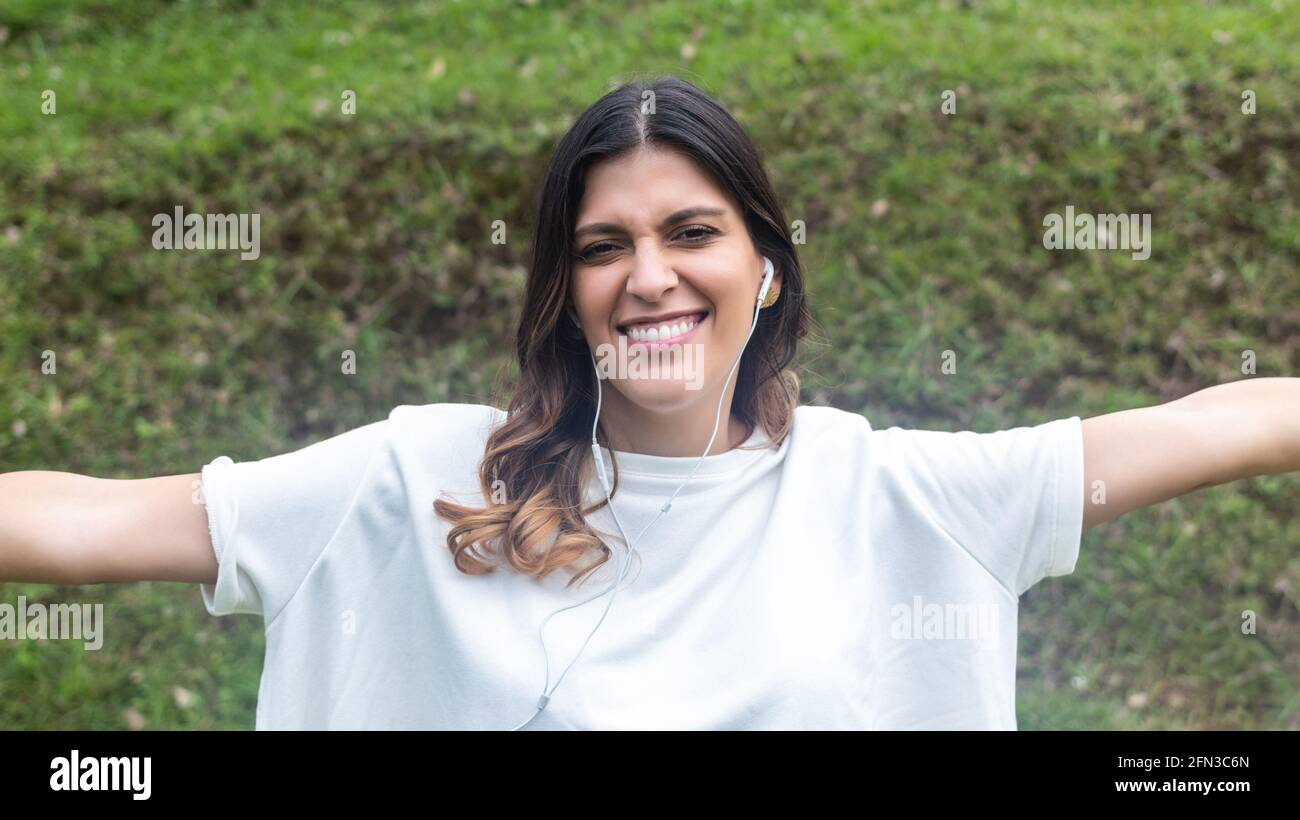 Latin young female arms hi-res stock photography and images - Alamy