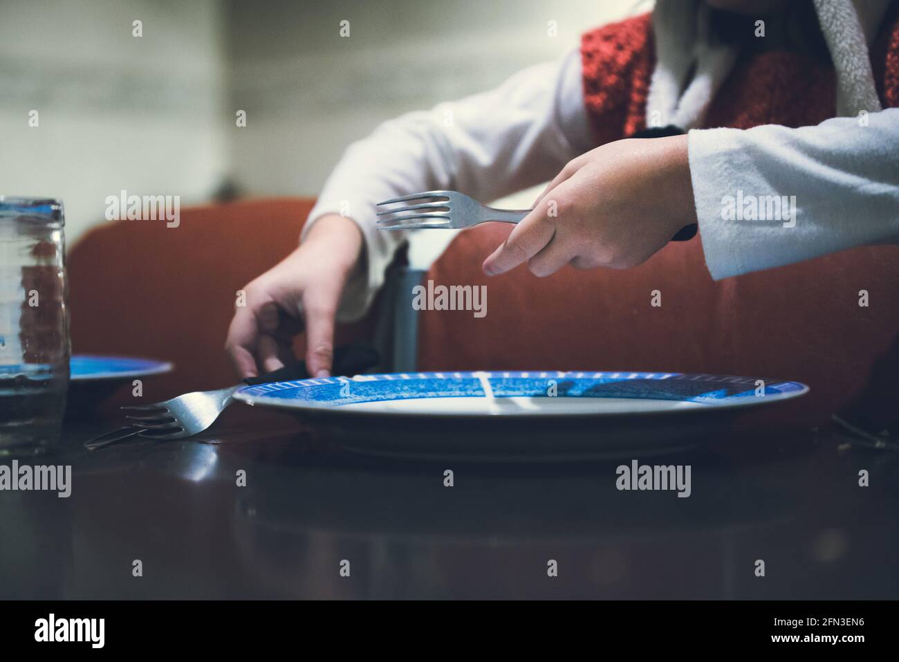 Preparing food with a recipe, eggs and flour, in these quarantine times at home. Stock Photo