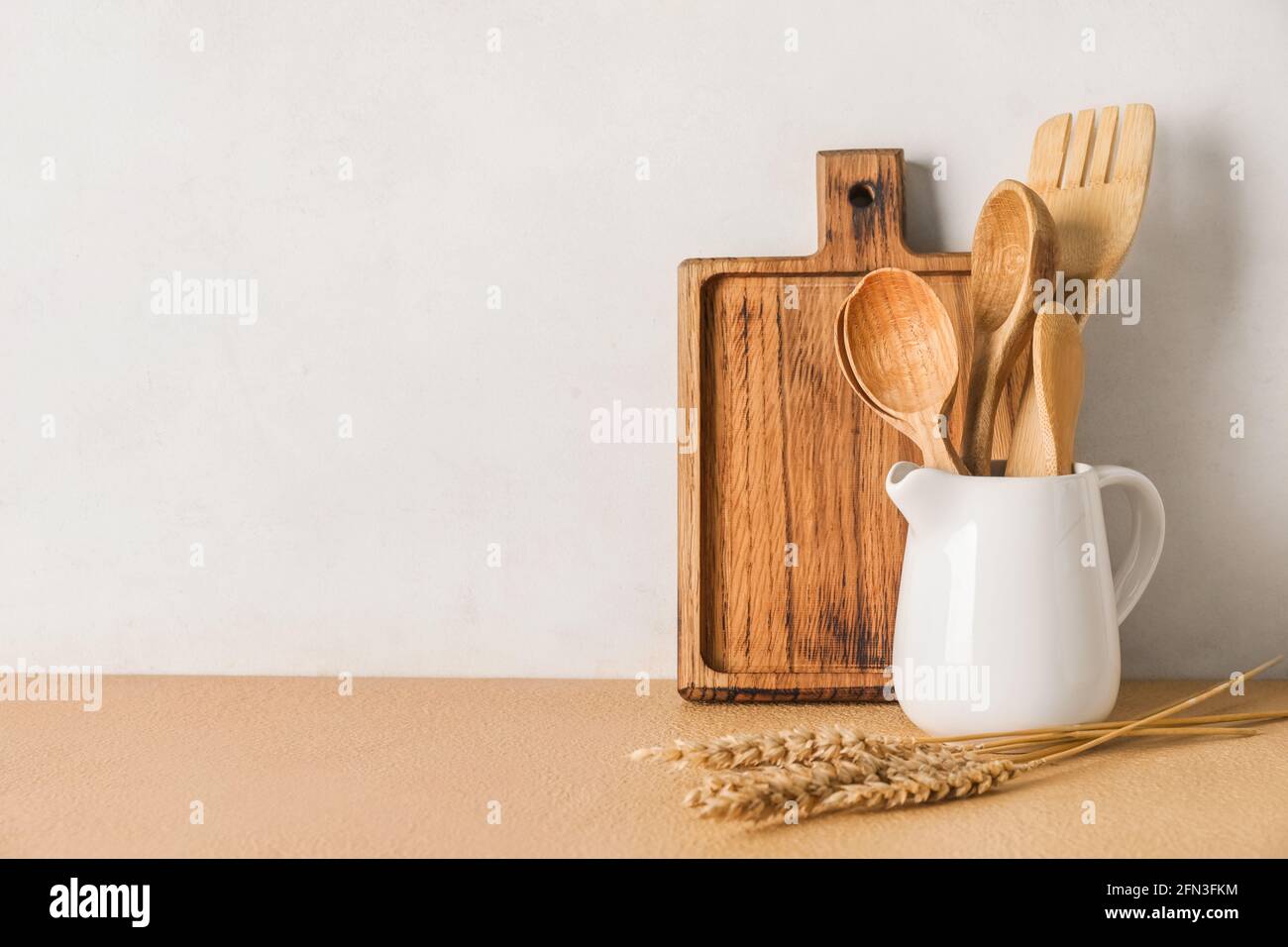 Set of kitchen utensils on light background Stock Photo - Alamy