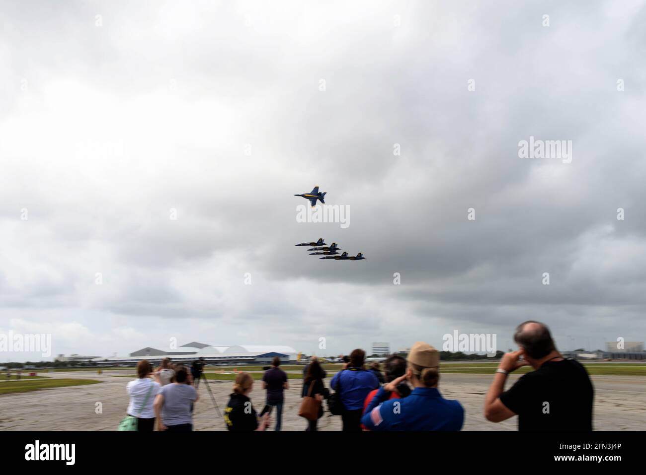 Melbourne, Brevard County Florida. USA May 13, 2021. The Great Florida Air Show Blue Angels aircraft arrive for this weekend's show. Ahead of the team's arrival “Fat Albert” the teams refurbished C-130 transport landed with the maintenance and support crew. Under cloudy skies the team arrived flying their new F/A-18 Super Hornets. Photo Credit: Julian Leek/Alamy Live News Stock Photo