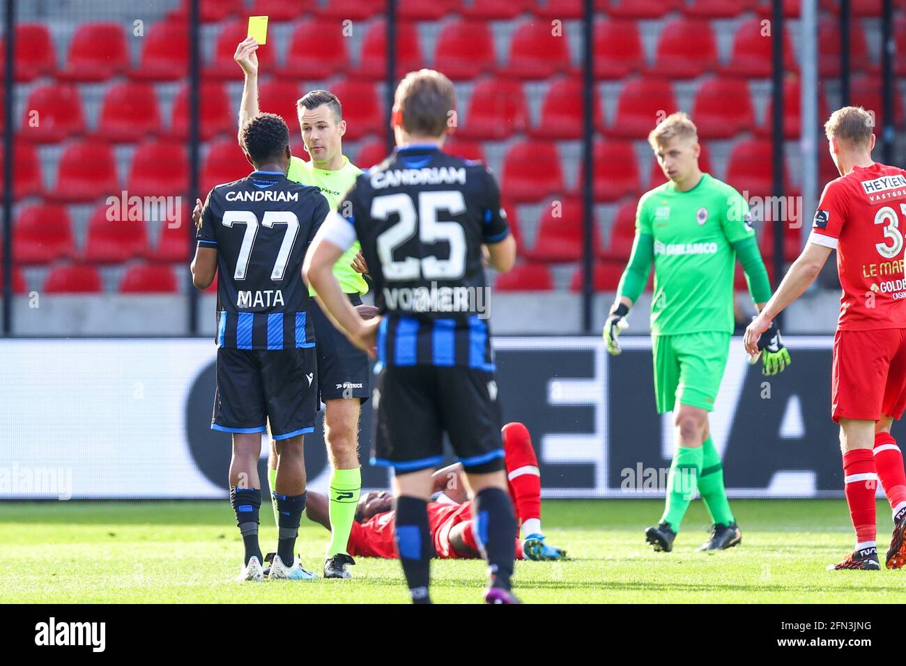 ANTWERP, BELGIUM - MAY 13: Clinton Mata of Club Brugge receiving a yellow card by referee Bram van Driessche during the Jupiler Pro League match betwe Stock Photo