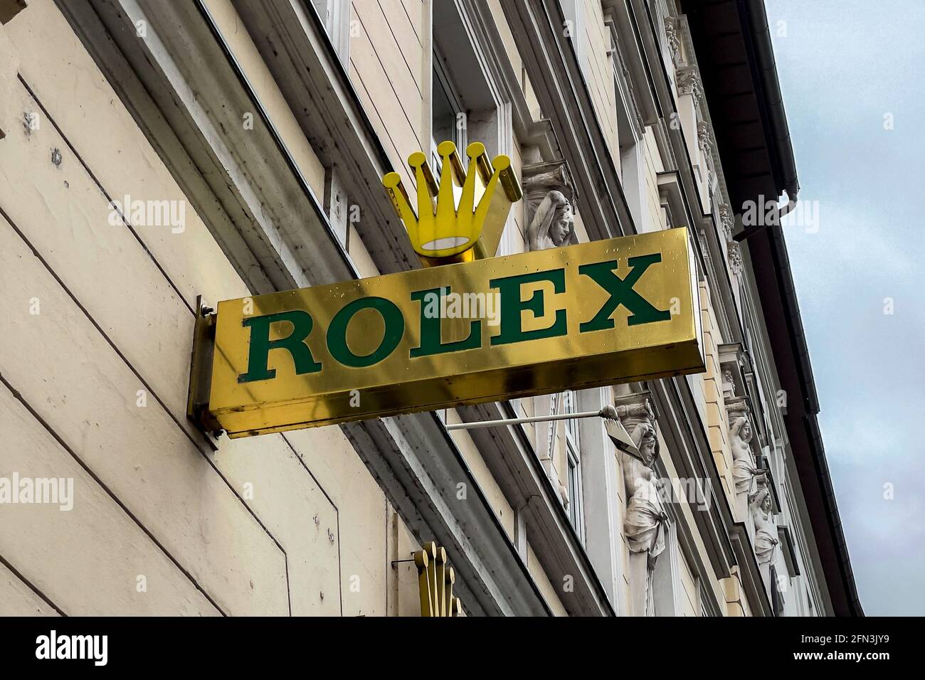 Rolex store sign in Munich town center Stock Photo - Alamy