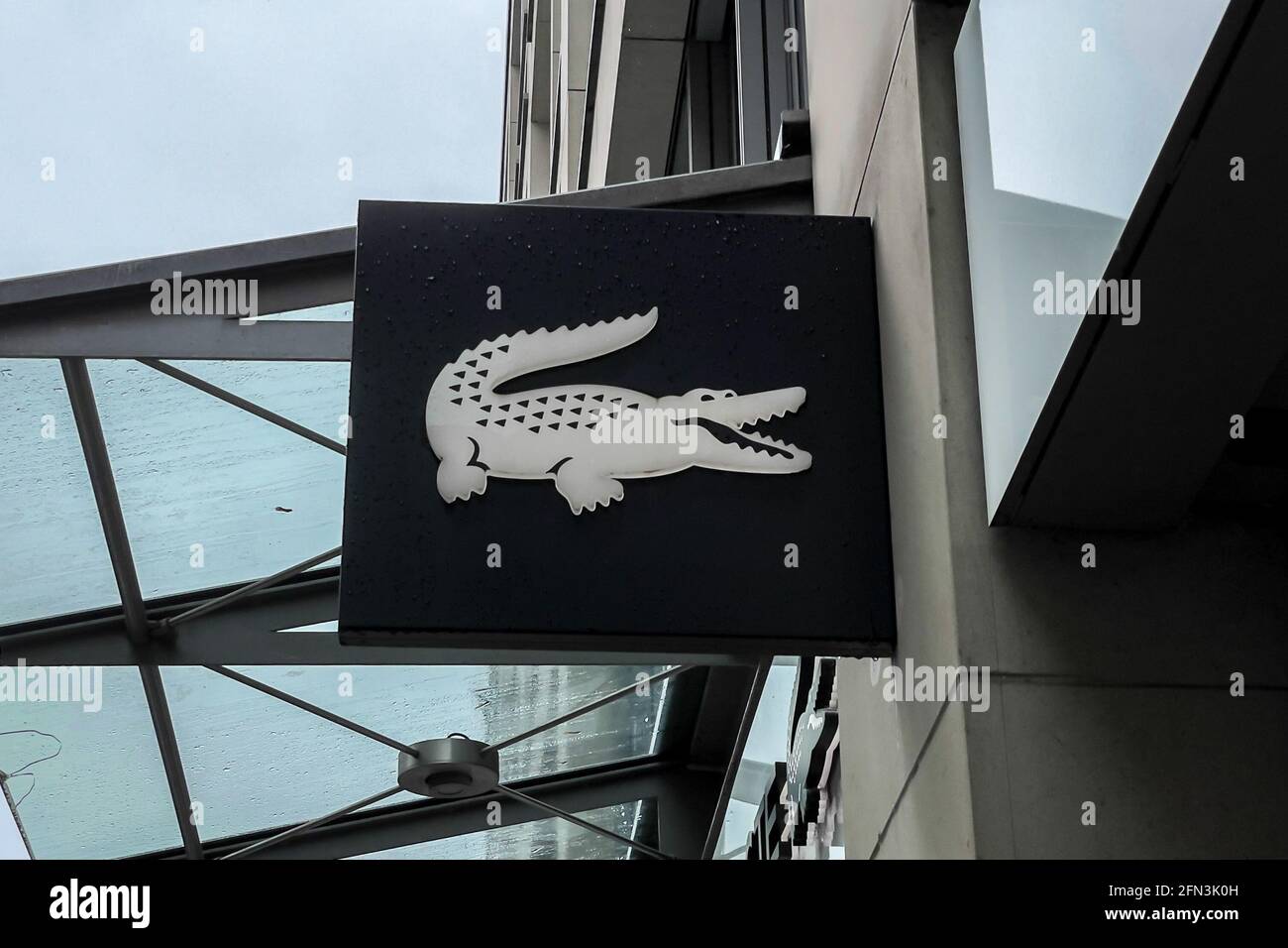Lacoste store sign in Munich town center Stock Photo