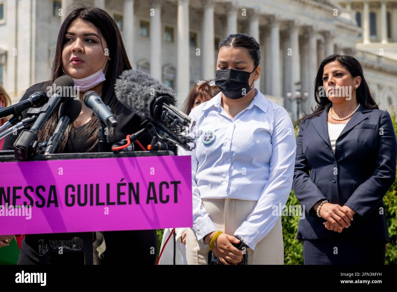 Mayra Guillen, left, and Lupe Guillen, center, sisters of Vanessa Guillen offer remarks during a press conference for the reintroduction of the I am Vanessa Guillén Act, outside the US Capitol in Washington, DC, Thursday, May 13, 2021. The killing of 20 year-old Army Specialist Vanessa Guillen at Fort Hood in Texas last year caused outrage, as Guillen's family said Vanessa was harassed prior to being killed. Credit: Rod Lamkey/CNP /MediaPunch Stock Photo