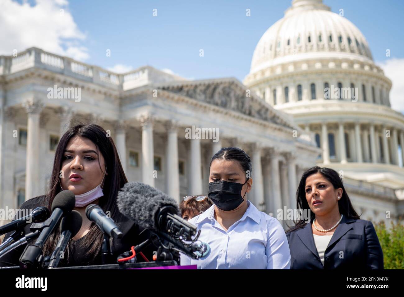 Mayra Guillen, left, and Lupe Guillen, center, sisters of Vanessa Guillen offer remarks during a press conference for the reintroduction of the I am Vanessa Guillén Act, outside the US Capitol in Washington, DC, Thursday, May 13, 2021. The killing of 20 year-old Army Specialist Vanessa Guillen at Fort Hood in Texas last year caused outrage, as Guillen's family said Vanessa was harassed prior to being killed. Credit: Rod Lamkey/CNP /MediaPunch Stock Photo