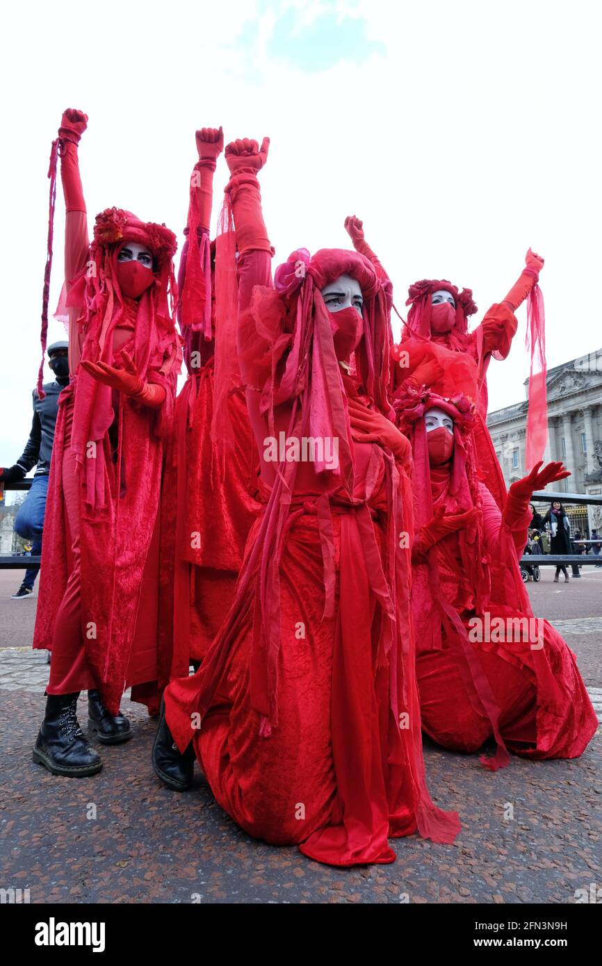The Rebel Red Brigade appear during a Kill the Bill protest. The performance troupe was created to highlight the global environmental crisis Stock Photo