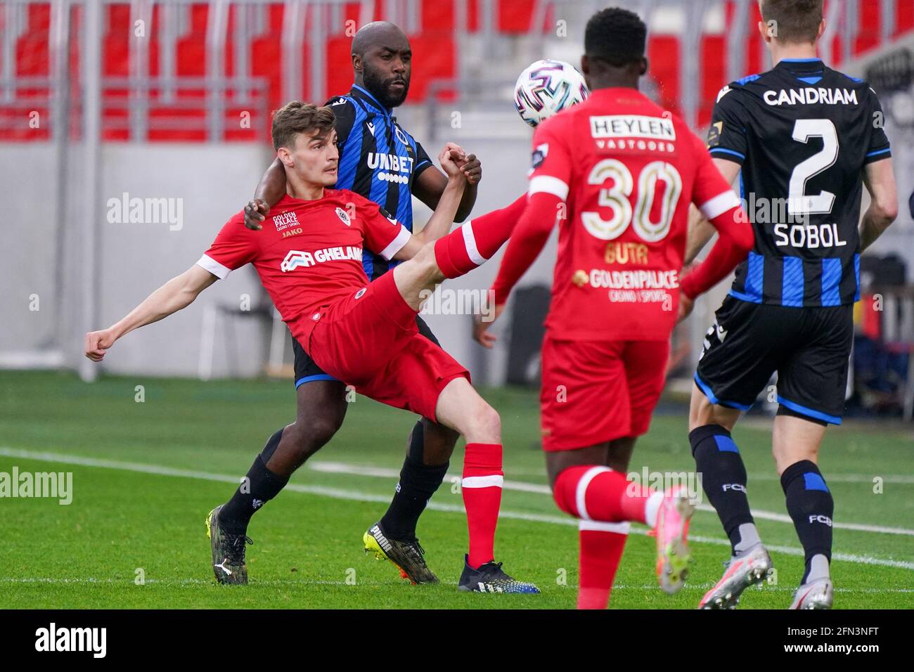 ANTWERP, BELGIUM - MAY 13: Eder Balanta of Club Brugge battles for posession with Pieter Gerkens of Royal Antwerp during the Jupiler Pro League match Stock Photo