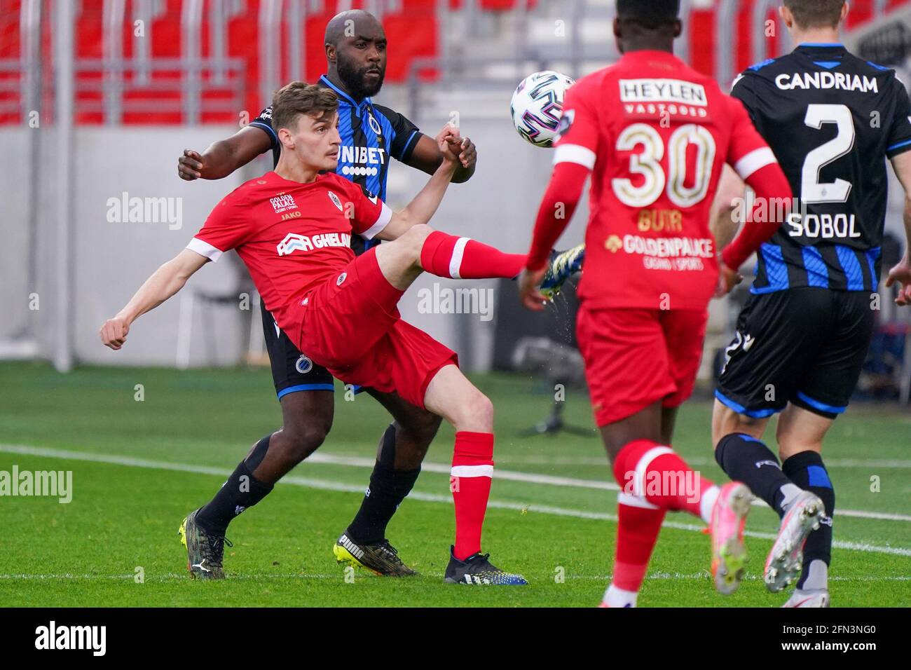 ANTWERP, BELGIUM - MAY 13: Eder Balanta of Club Brugge battles for posession with Pieter Gerkens of Royal Antwerp during the Jupiler Pro League match Stock Photo