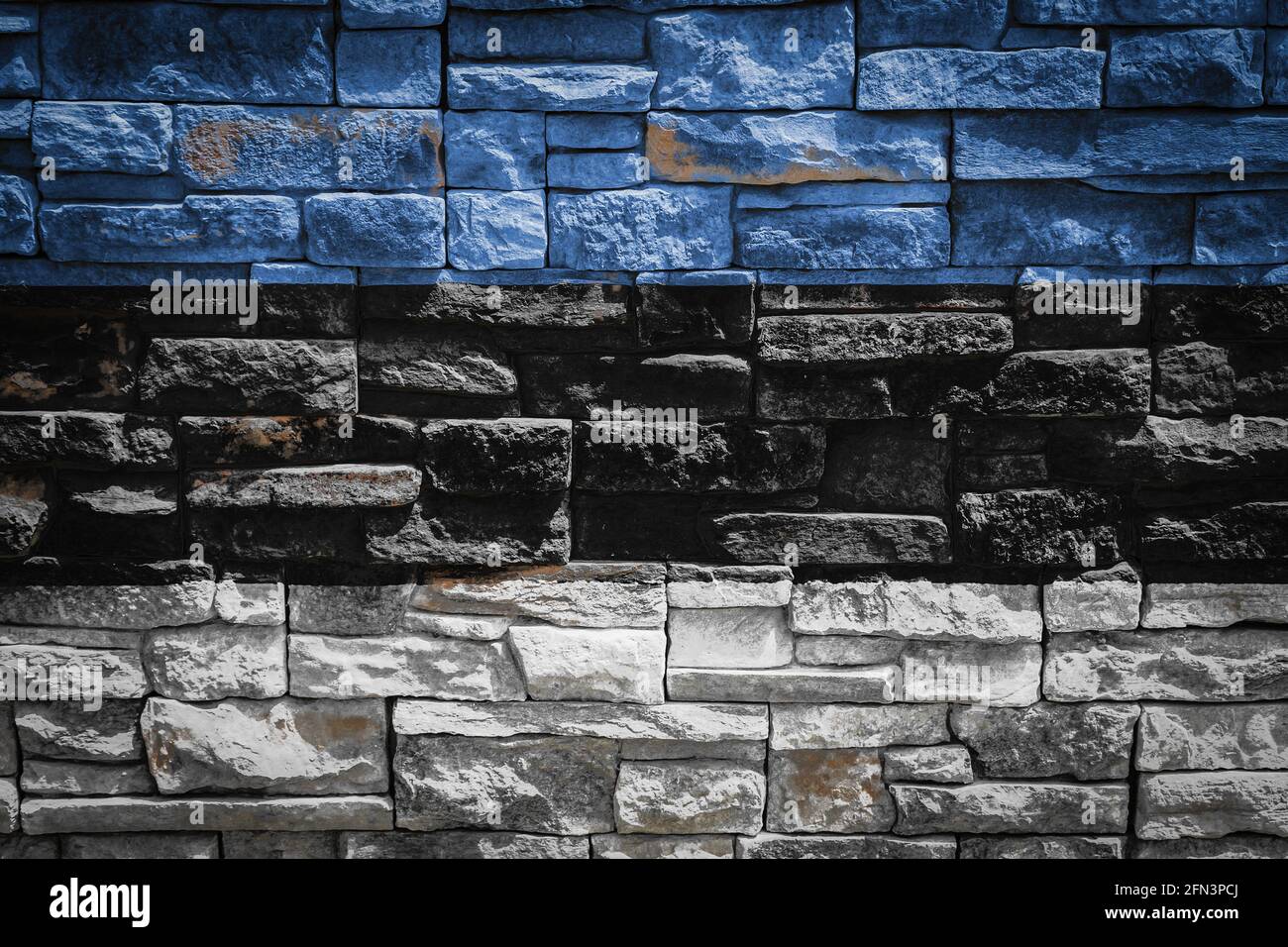 National flag of Estonia on stone wall background.The concept of ...