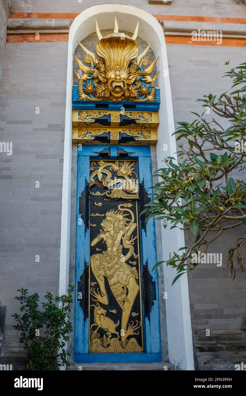 Wooden carved doors in Klungkung, Bali, Indonesia. Stock Photo