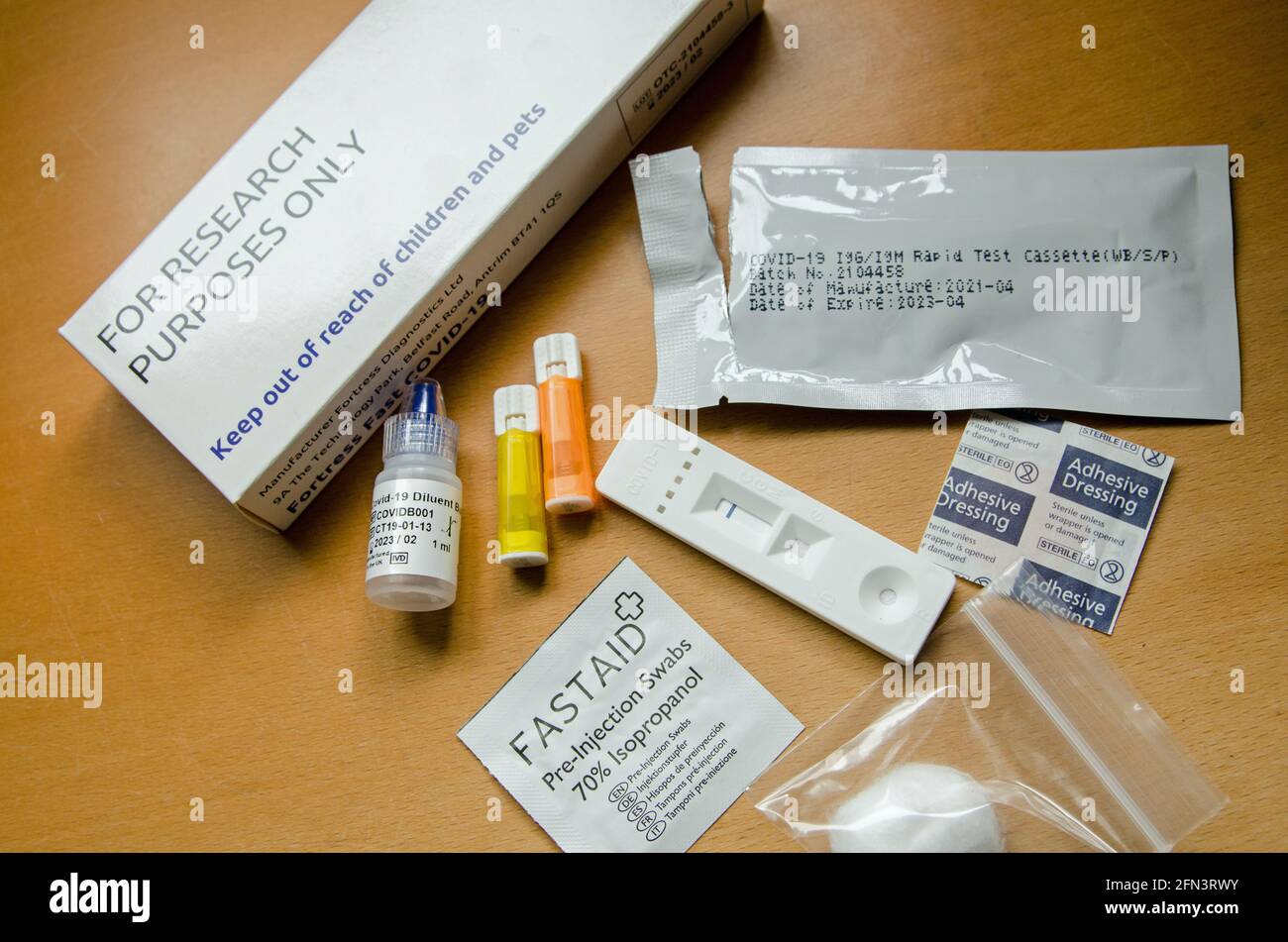 Basingstoke, UK - May 13, 2021: equipment for a COVID-19 antibody test as sent out by the NHS in England to work out how much of the population has a Stock Photo