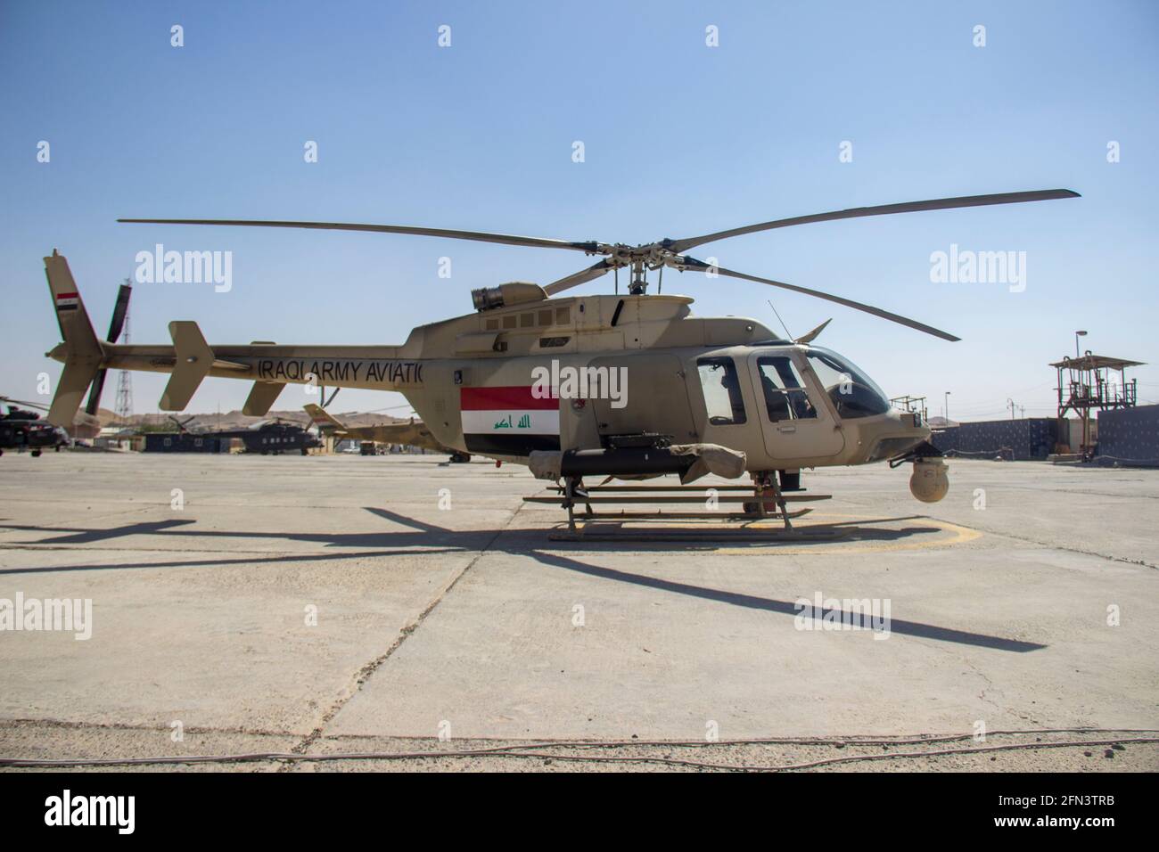 An Iraqi Army Aviation Bell 407GT light attack helicopter at a base during the 2016-2017 Mosul Operation. Stock Photo