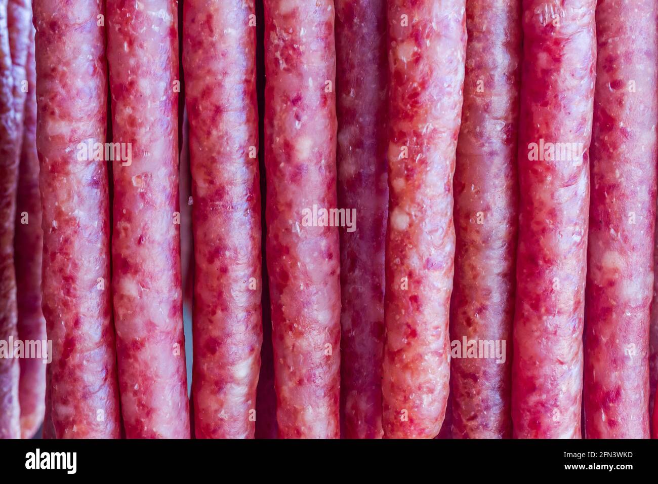 pork chinese sausage stacked in the chinese market Stock Photo Alamy