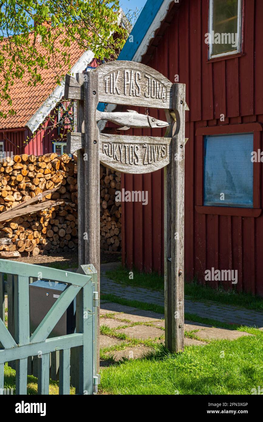 Smoked fish restaurant at Curonian Spit in Nida fishermen's village, Lithuania, Europe, vertical Stock Photo