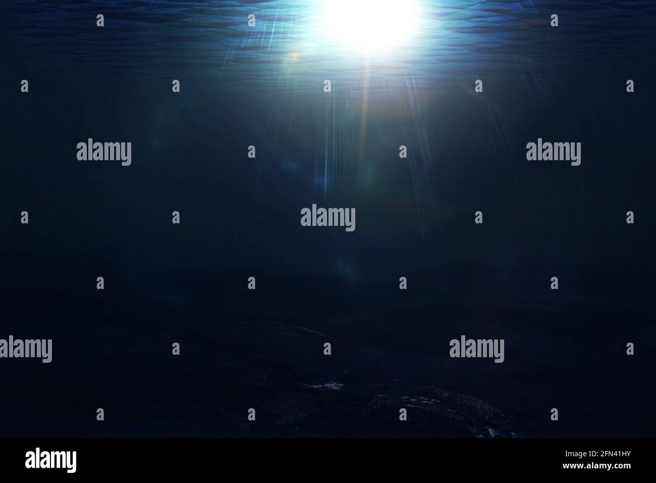 Dark blue underwater scene with sun rays through ocean surface Stock ...