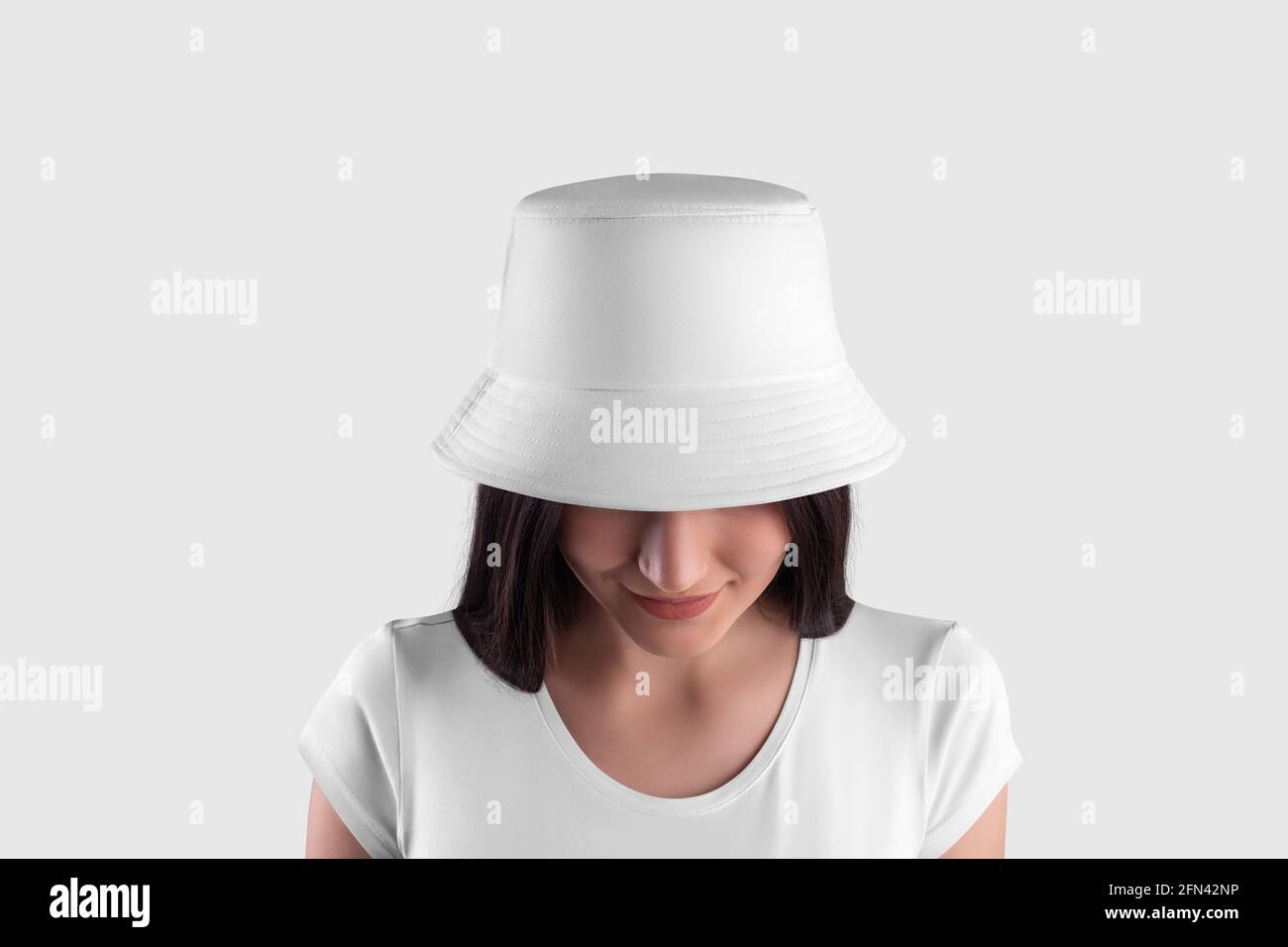 Download Mockup Of A White Panama On A Dark Haired Girl In A T Shirt With Her Head Down Close Up Front View Isolated On Background Fashion Hat Template Fo Stock Photo Alamy