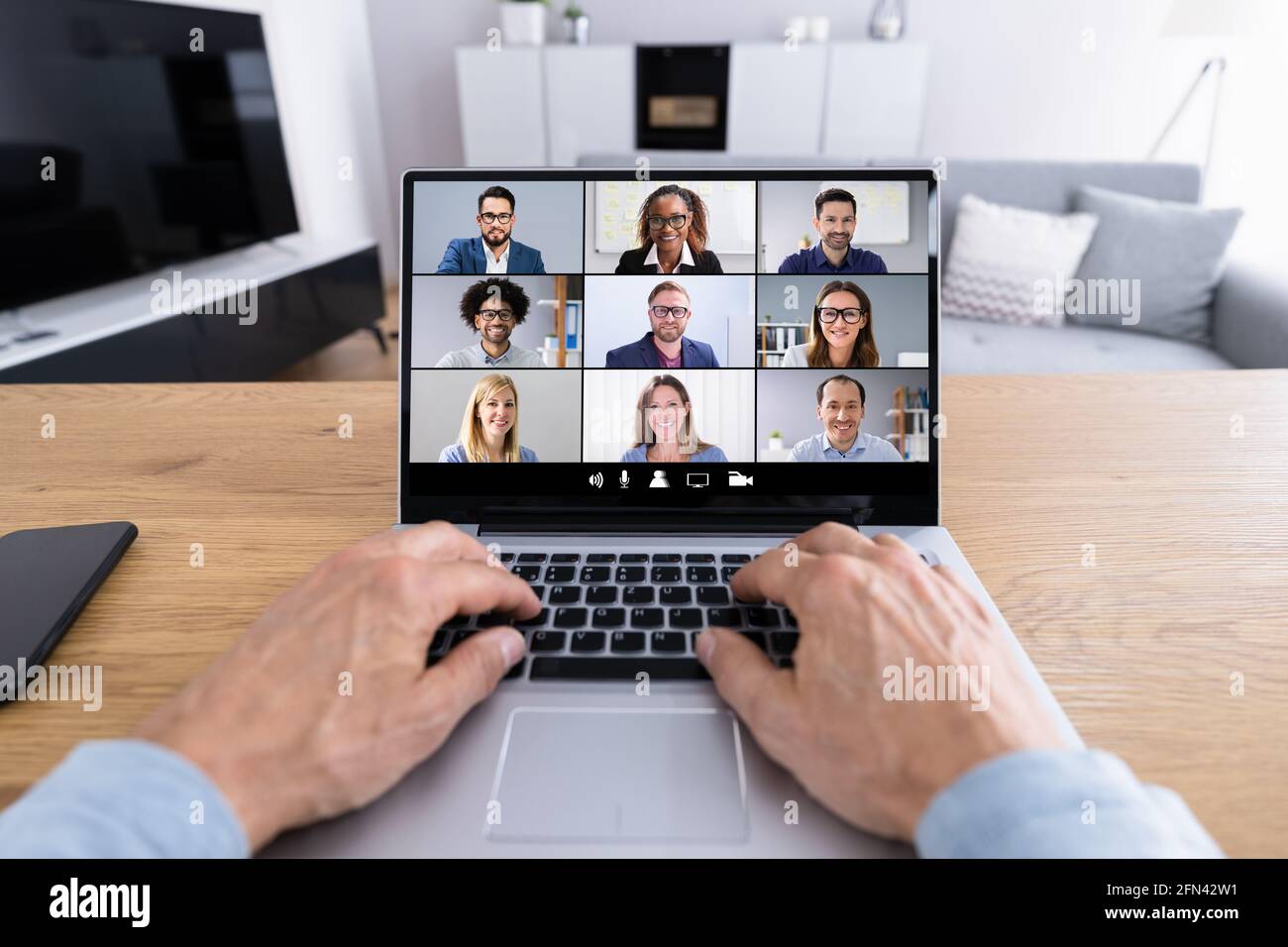 Online Video Conference Webinar. Man Working From Home Stock Photo