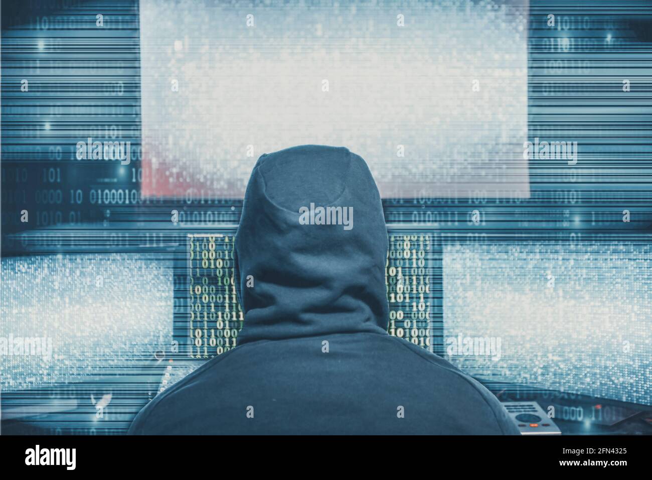 Hacker coding virus ransomware using laptops and computers. Cyber ...