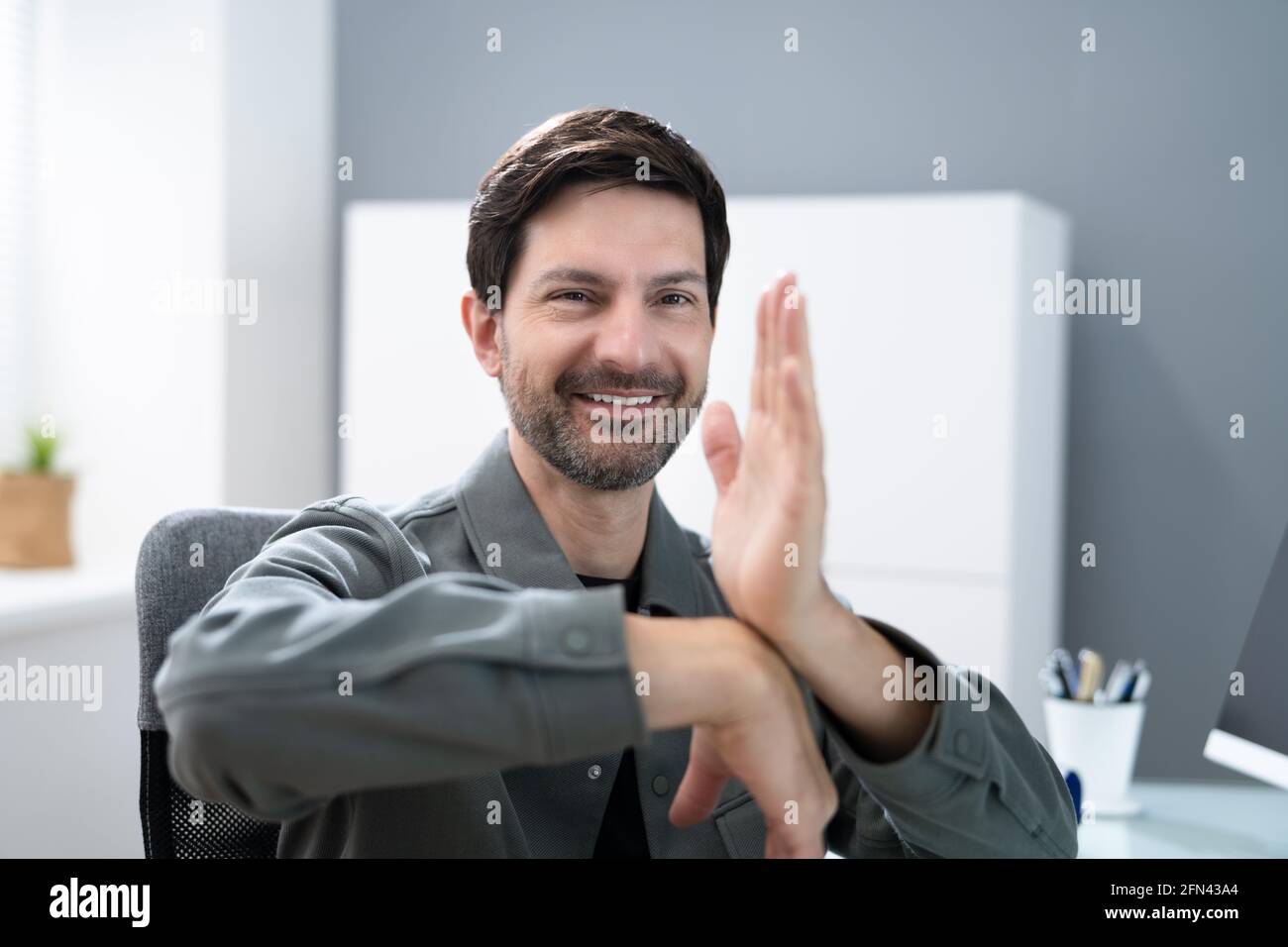 Adult Learning Sign Language For Deaf Disabled Stock Photo