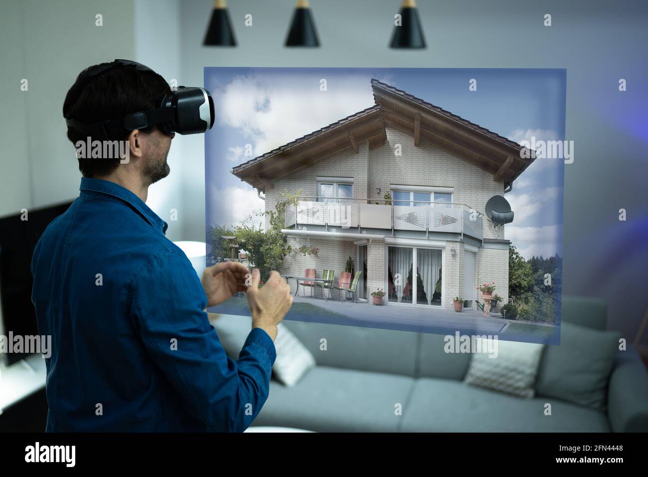 Virtual Real Estate House Tour Using VR Headset Stock Photo