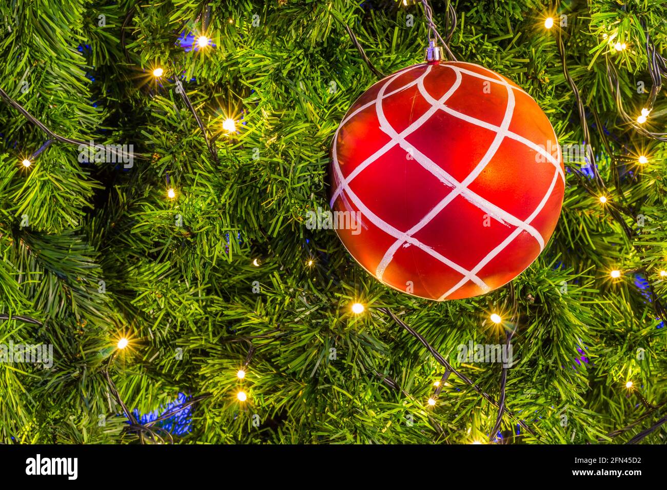 Christmas tree with colorful balls background Stock Photo - Alamy