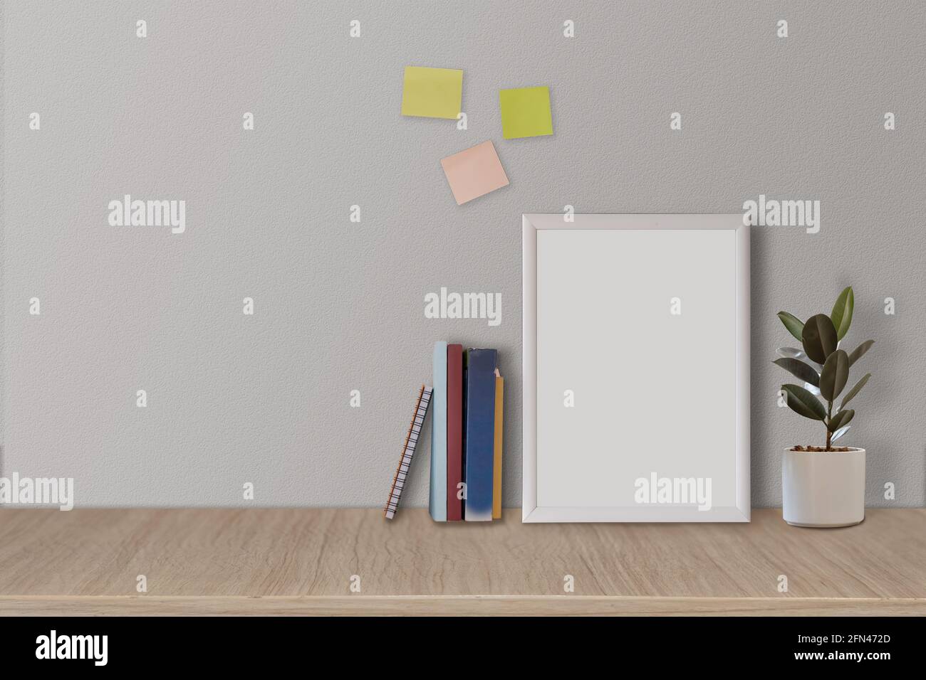 Frame or Poster mock up in living room and with postit with white walls. Modern and floral concept Stock Photo