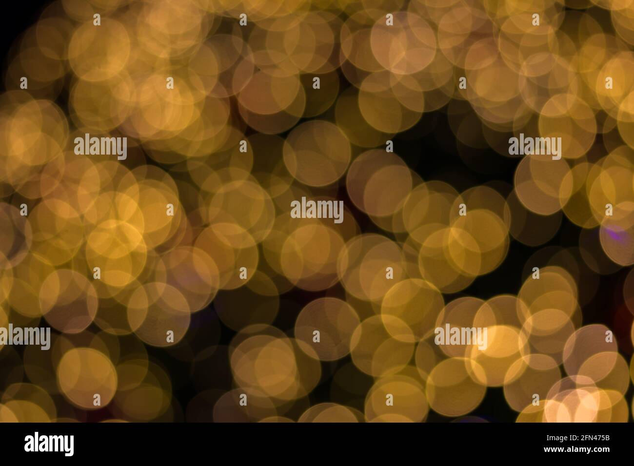 Bokeh Defocused ligths of golden Christmas tree background Stock Photo ...