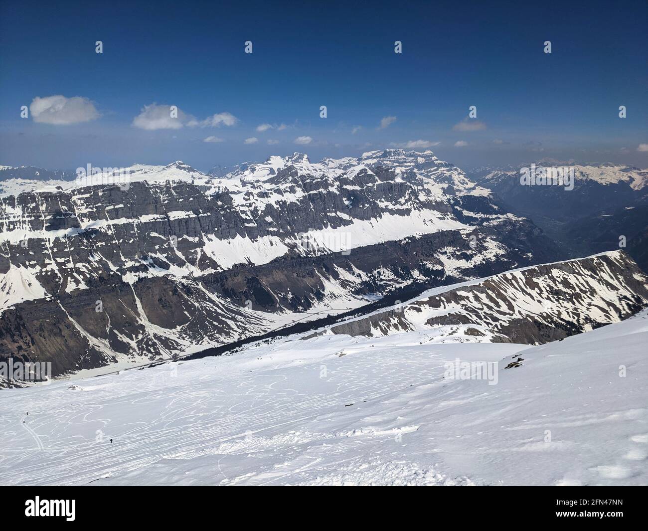 ski mountaineering swiss mountains with a fantastic view of the snowy mountains. Urnerboden piz russein ski freeride Stock Photo