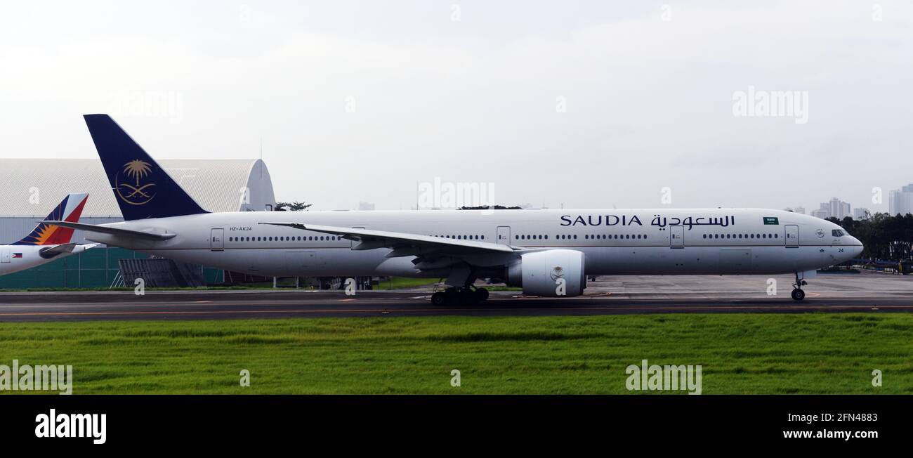 A Saudia aircraft on the tarmac at  Manila international airport. Stock Photo