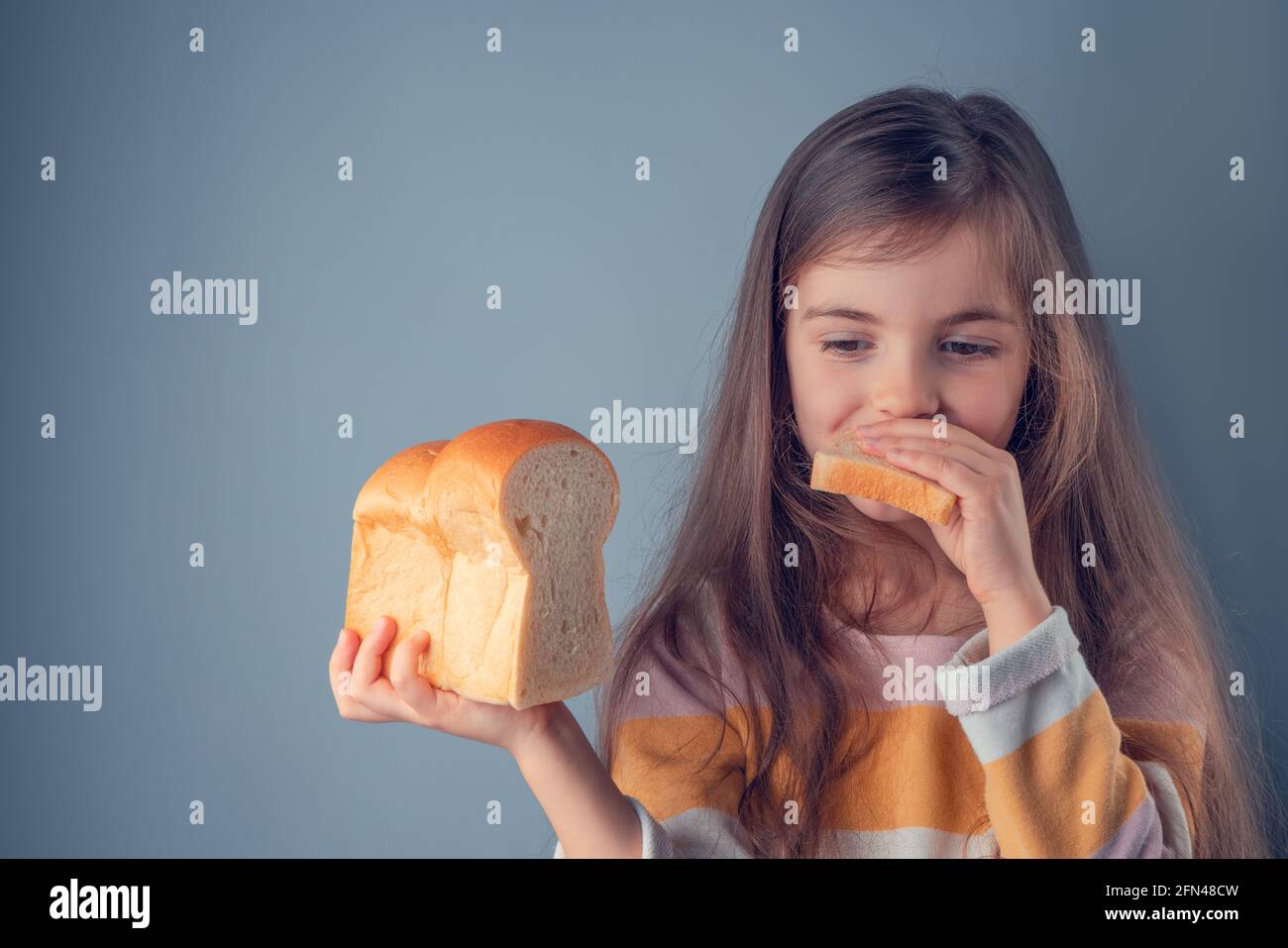 Little girl hold slice of homemade healthy bread Stock Photo Alamy