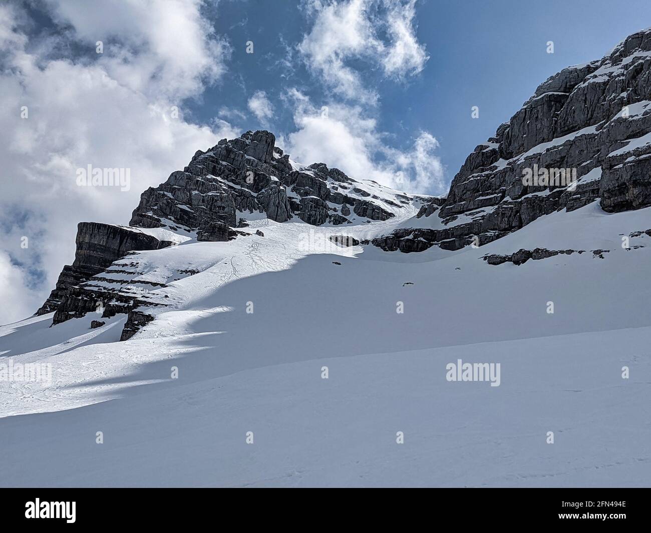 north couloire on the mutteristock. Pure adrenaline. Super freeride conditions. Adventure in the mountains, ski tour Stock Photo