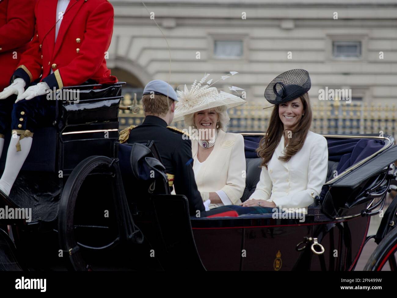 Kate Middleton Princess of Wales  Camilla Parker Bowles Prince Harry in Open Carriage Outside Buckingham Palace Trooping The Colour Stock Photo