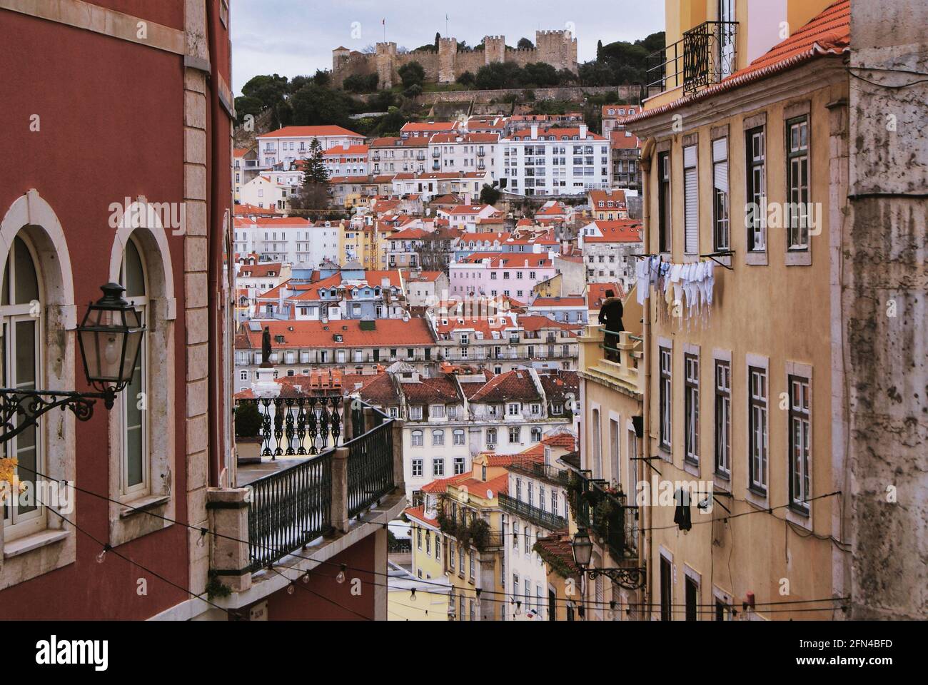Portuguese colorful houses in Lisbon. Roofs and windows in the Portuguese capital on a spring day. Stock Photo