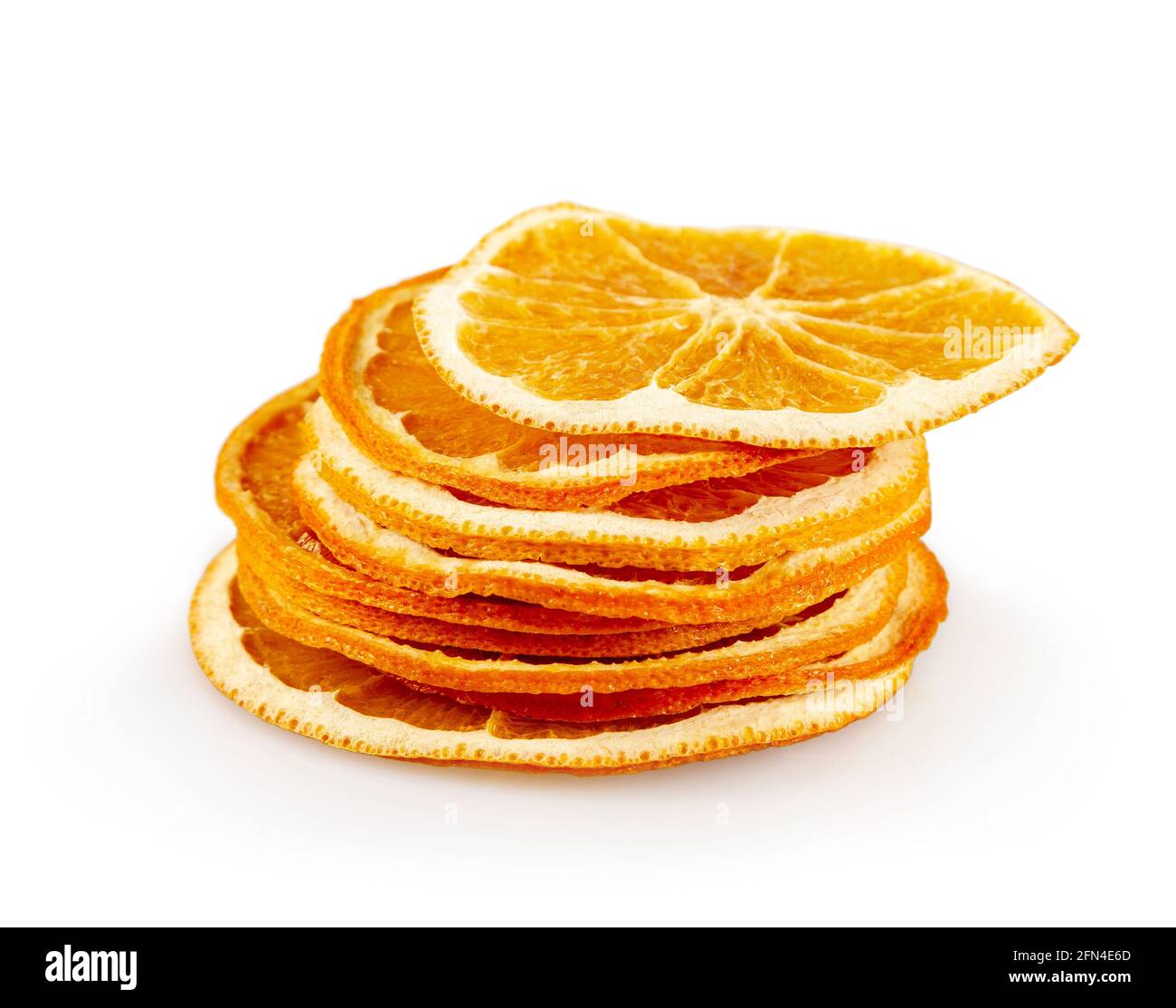 Stack of dried orange slices on a white background Stock Photo - Alamy