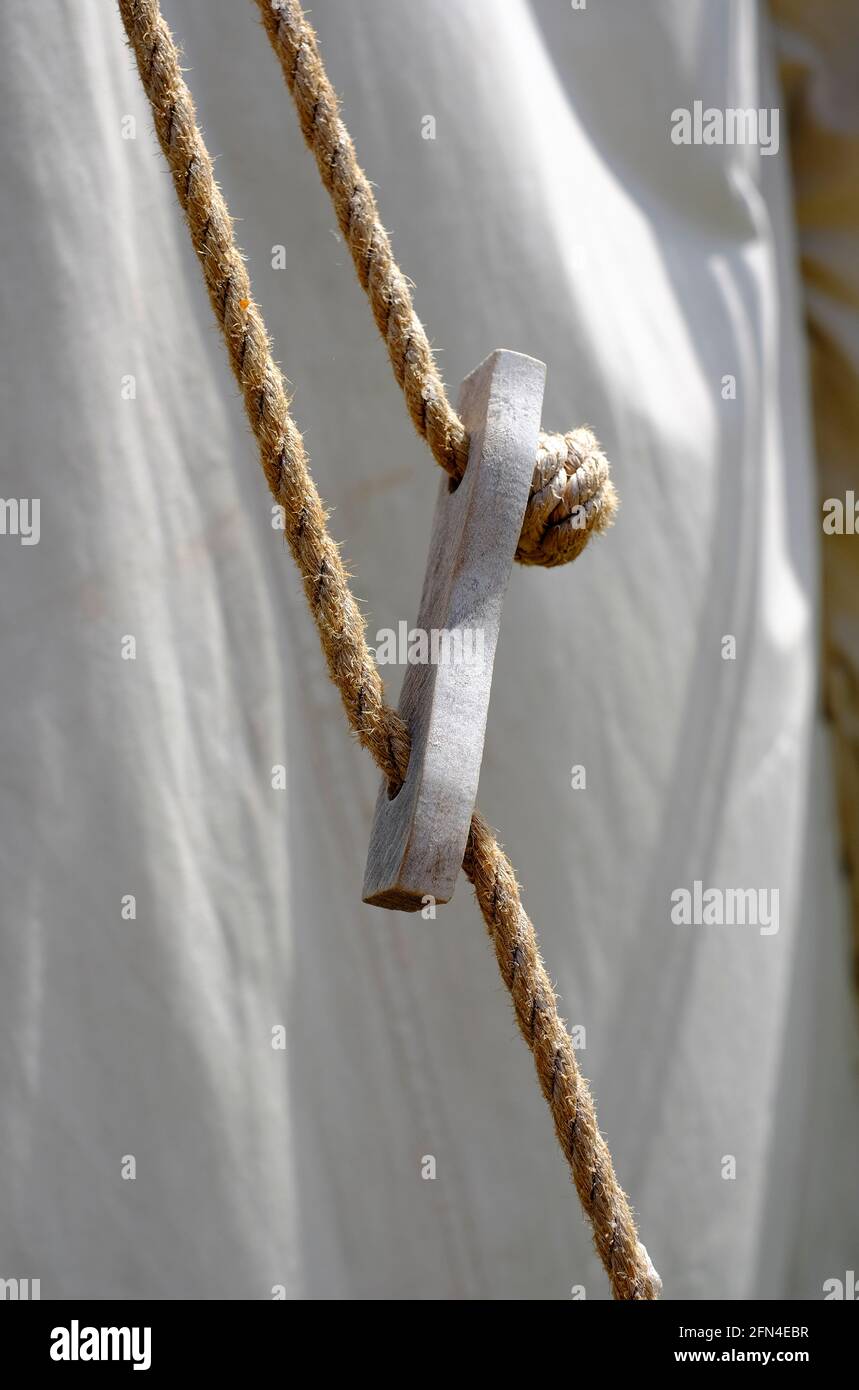 close up of canvas tent guide rope toggle, norfolk, england Stock Photo ...
