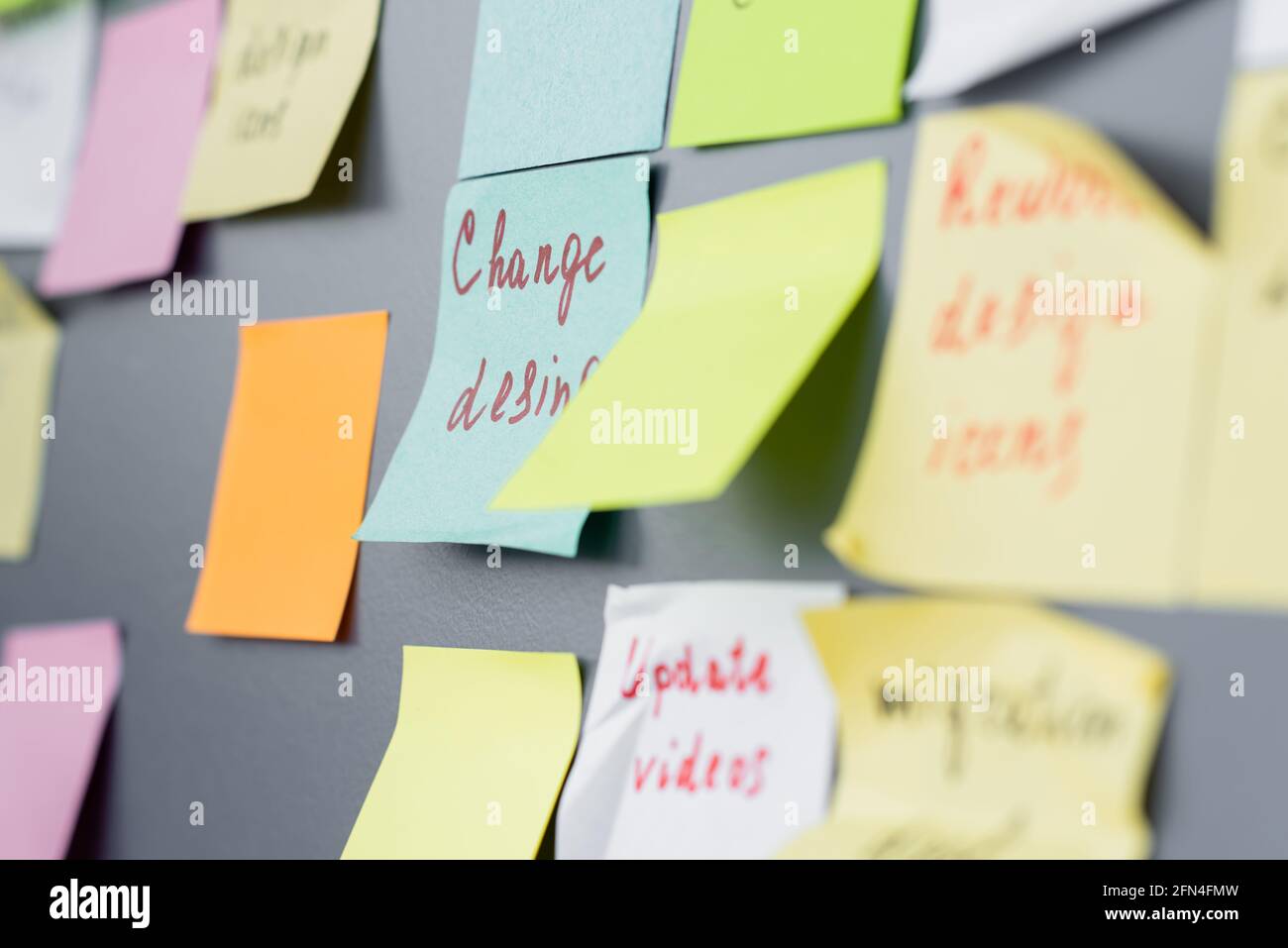 Colorful sticky notes with lettering on board in office Stock Photo - Alamy