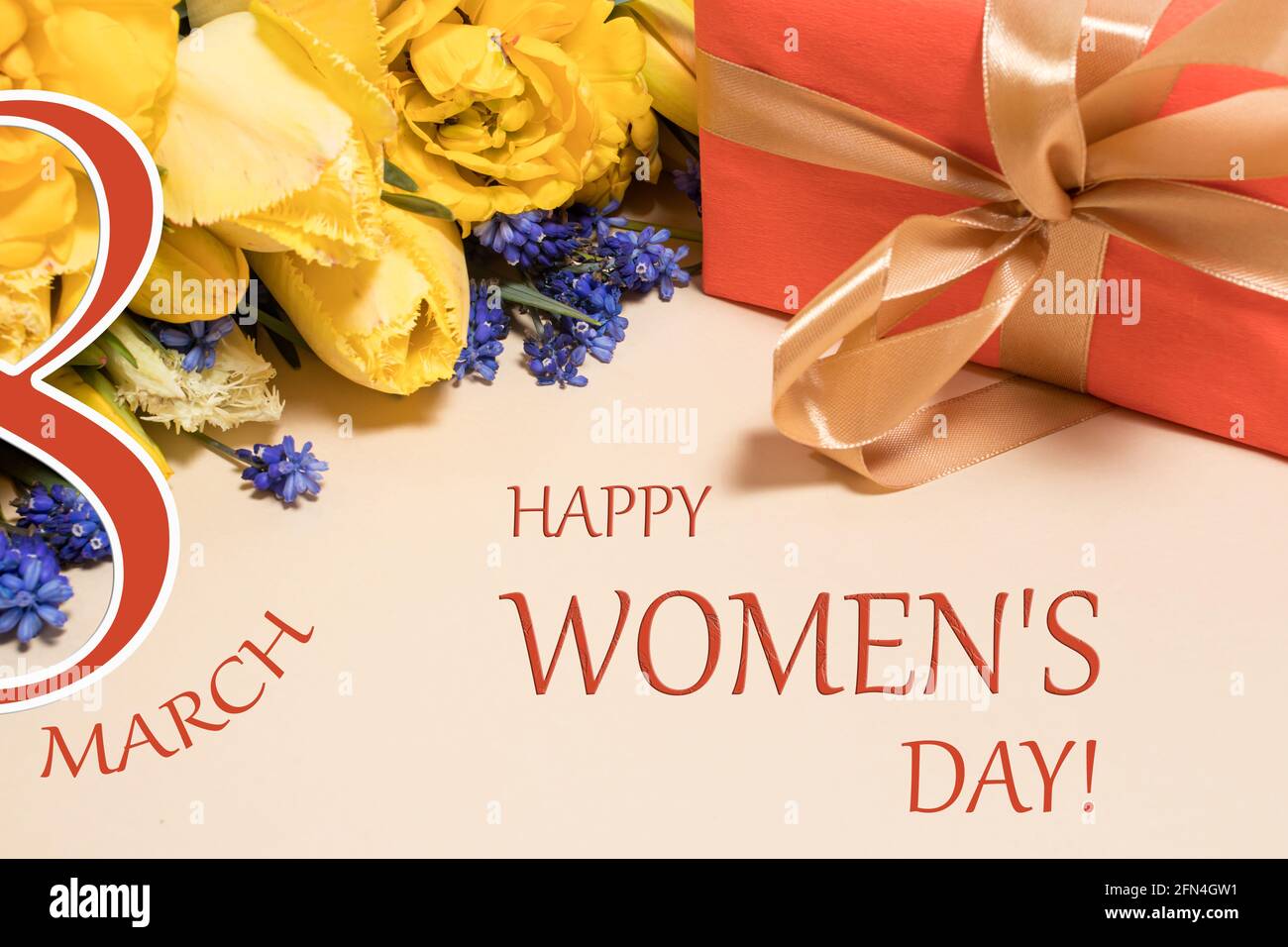 Tulips and gift box with inscription 8 March happy women's day ...