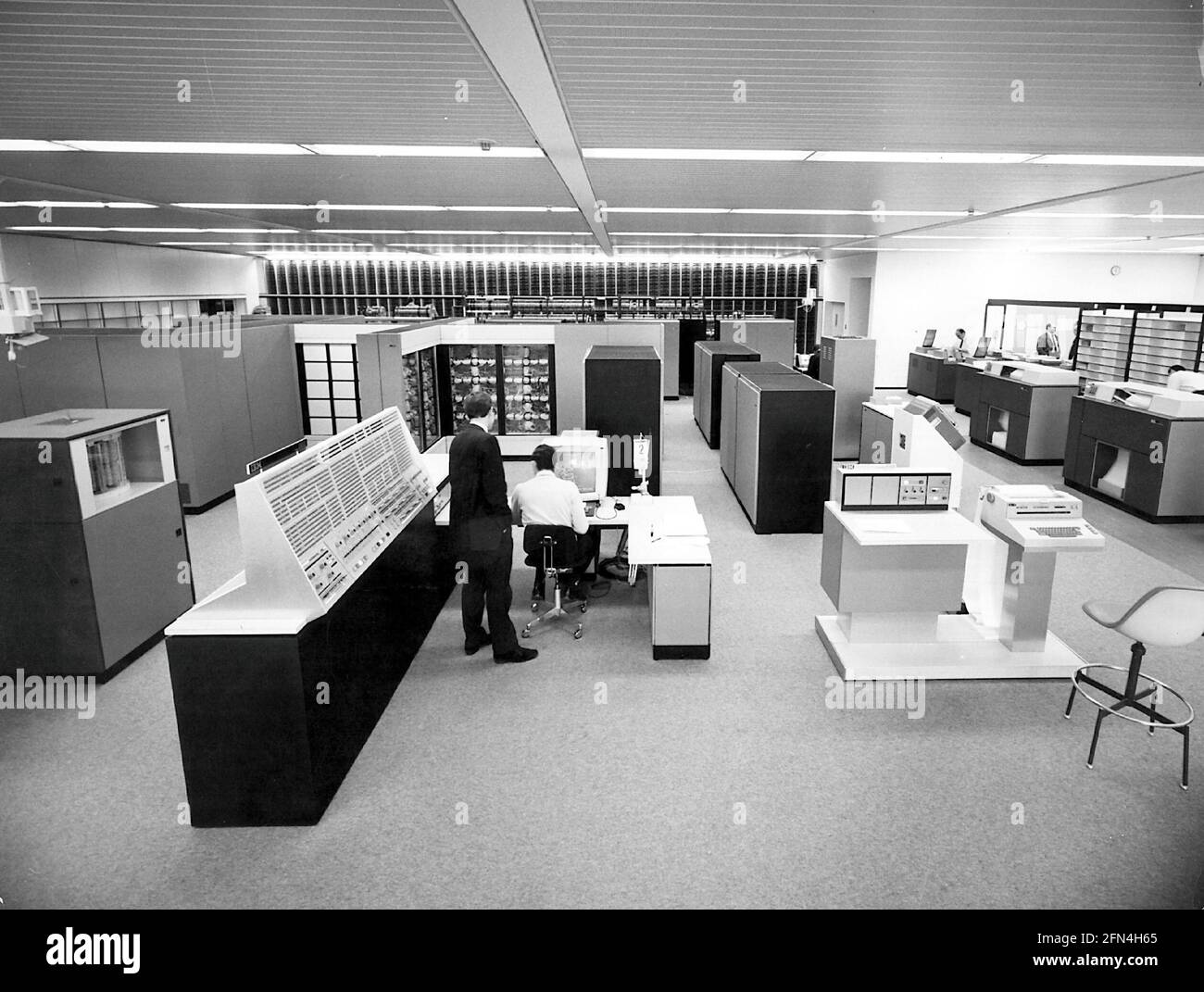 technics, office, computer, clerk in data processing center, ADDITIONAL-RIGHTS-CLEARANCE-INFO-NOT-AVAILABLE Stock Photo