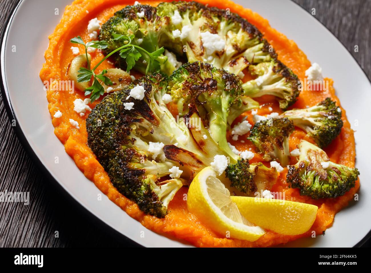 grilled broccoli steak with butternut squash mash topped with crumbled