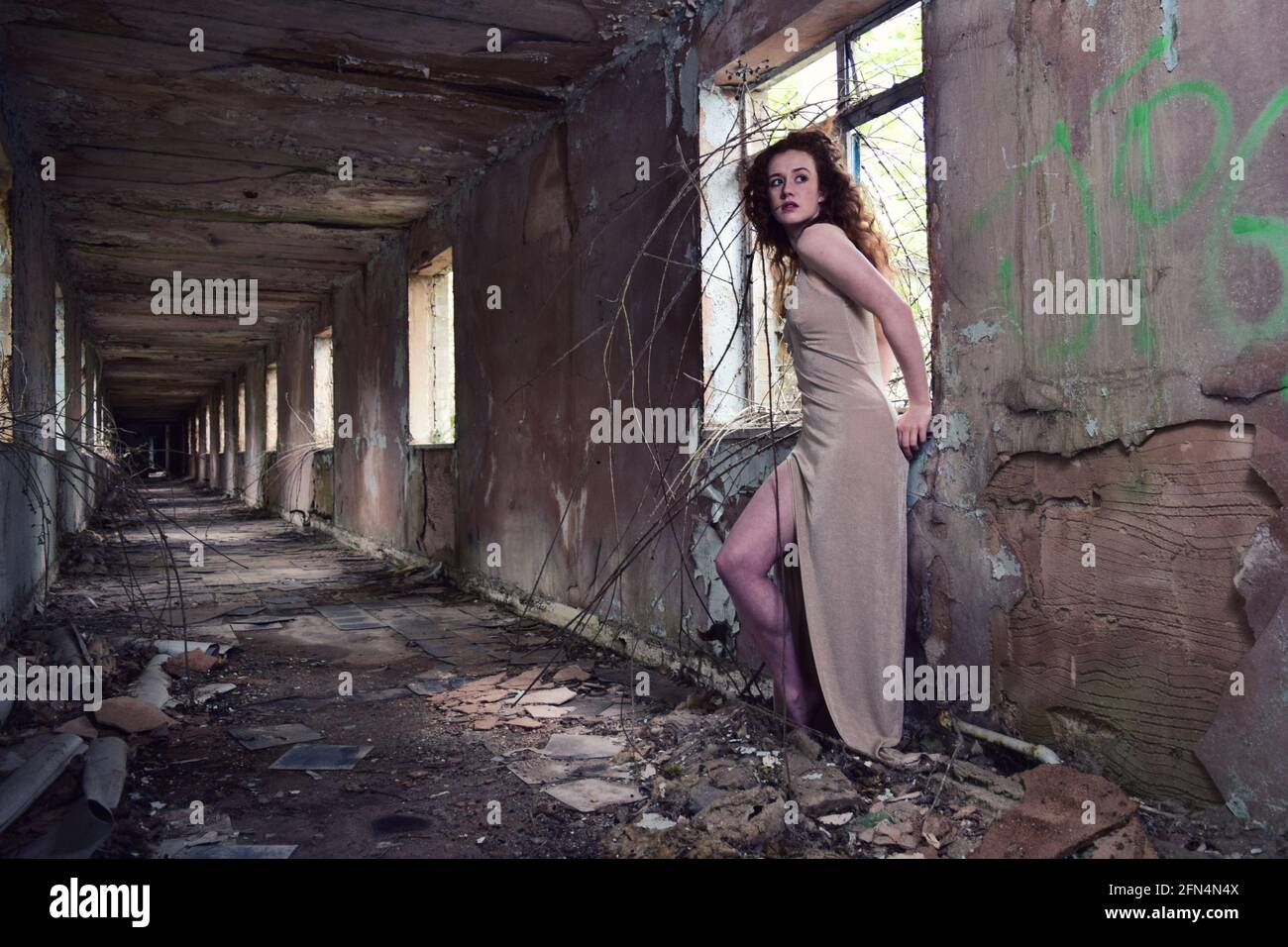 Women in abandoned building Stock Photo