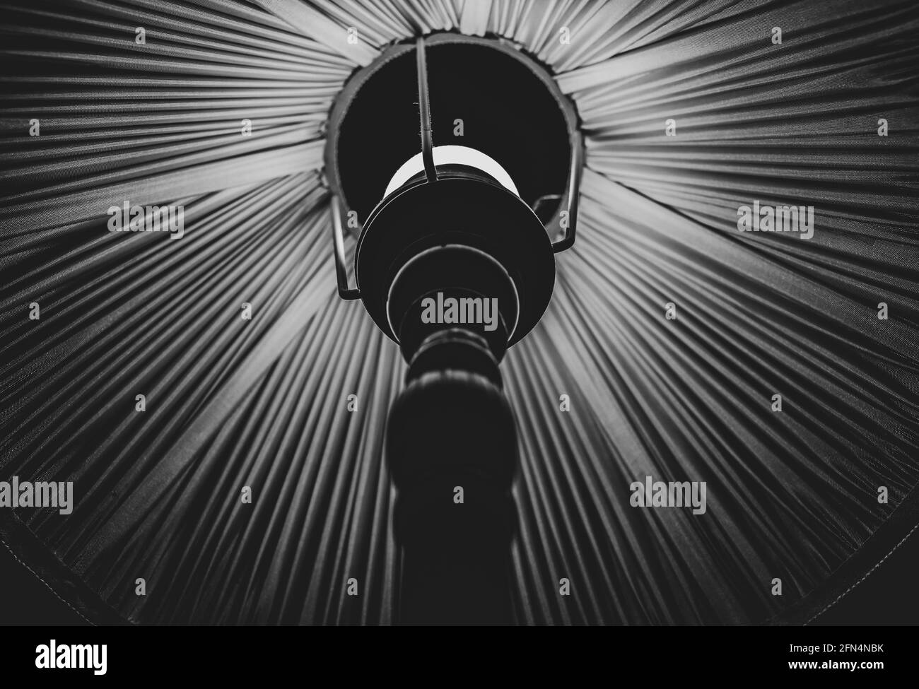 Conceptual black and white shot from a down angle of a lamp abajur Stock Photo
