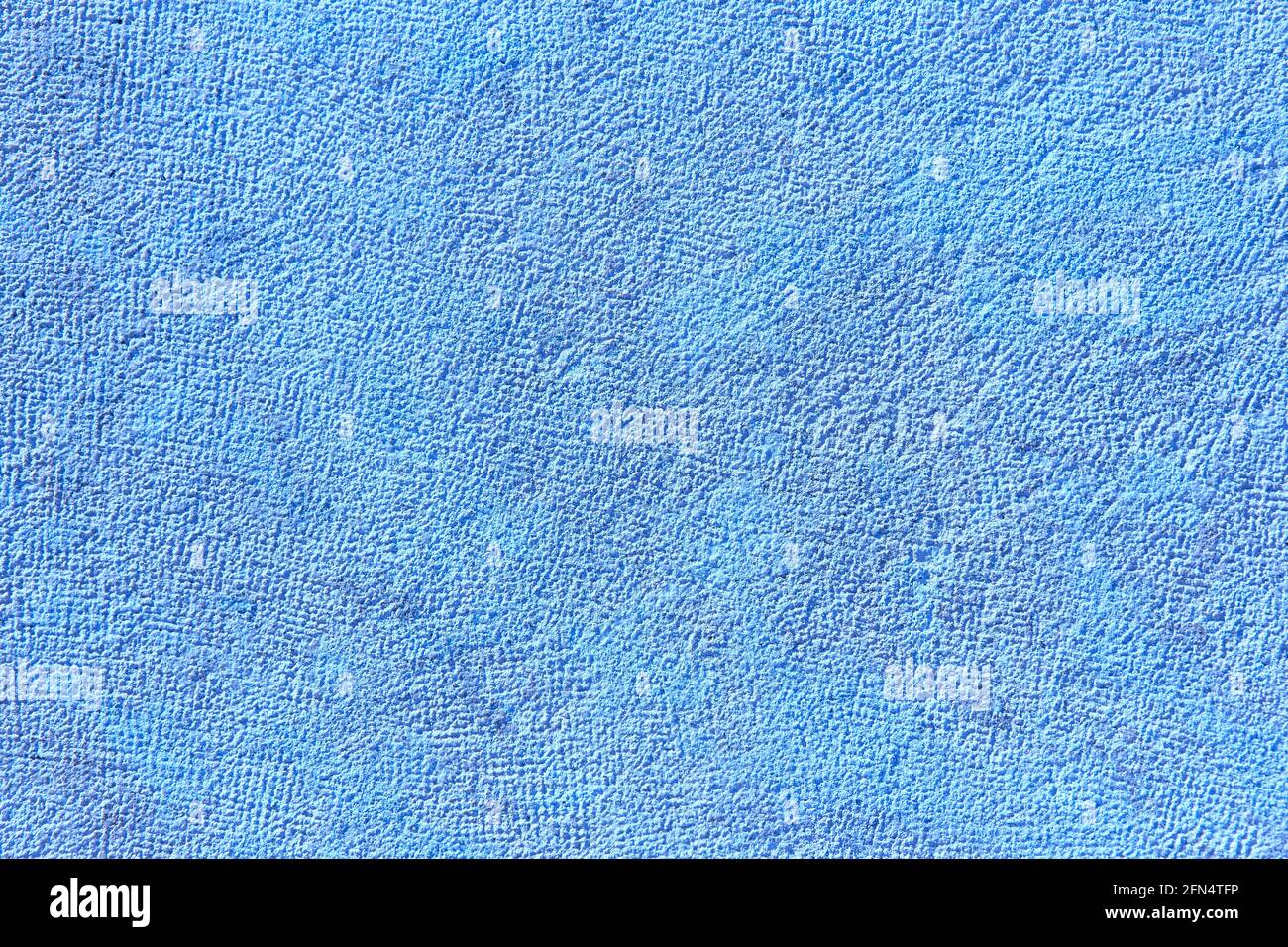 Textured blue stone wall background. Rough surface. Copy space Stock Photo
