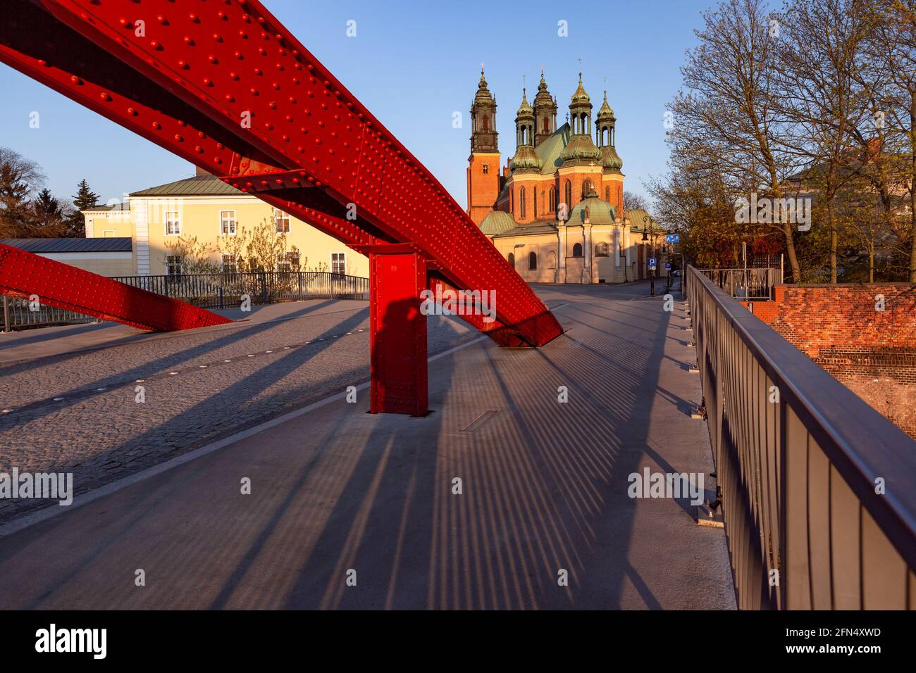 Bishop Jordan Bridge over Cybina River and Poznan Cathedral in sunny morning, Poznan, Poland. Stock Photo