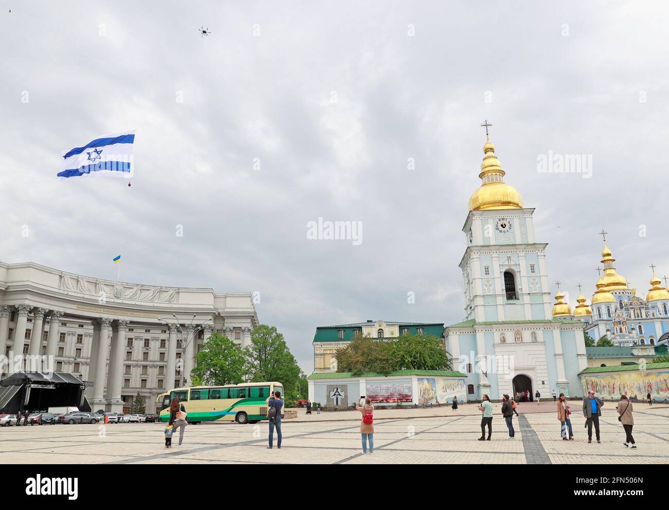 An Israeli flag attached to a drone flies over the Mykhailivska Square during an action organized by pro-Israel activists in Kyiv, Ukraine May 14, 2021. REUTERS/Valentyn Ogirenko Stock Photo